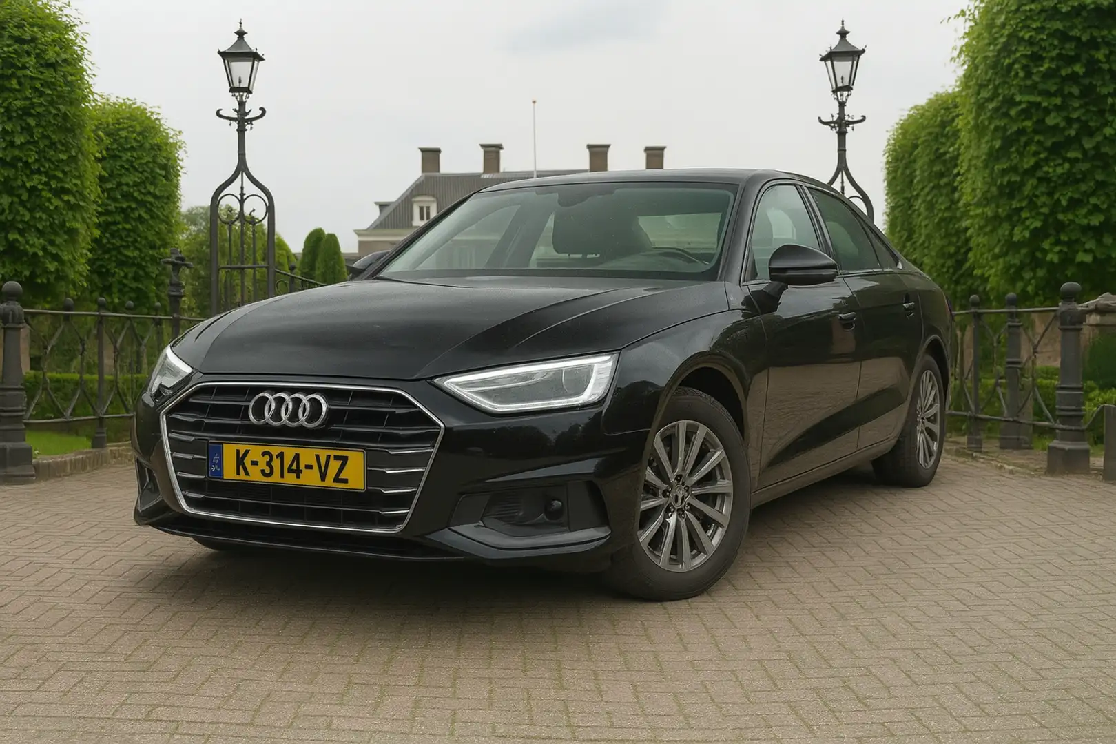 Audi A4 Limousine 40 TFSI Business Edition | DEALER-OH! | Zwart - 1