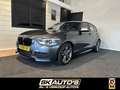 BMW 135 M135I XD. HIGH EXE. NAP l 320PK l MEMORY l H&K l M Grijs - thumbnail 1