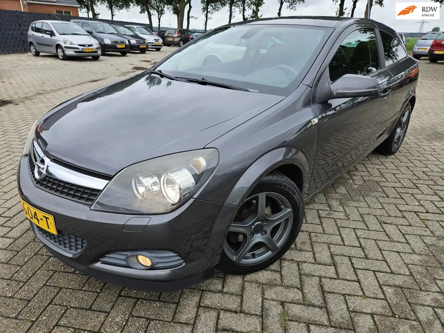 Opel Astra GTC 1.4 Business. 2009. Airco/Cruise/Lichtmetaal/T Grijs - 1