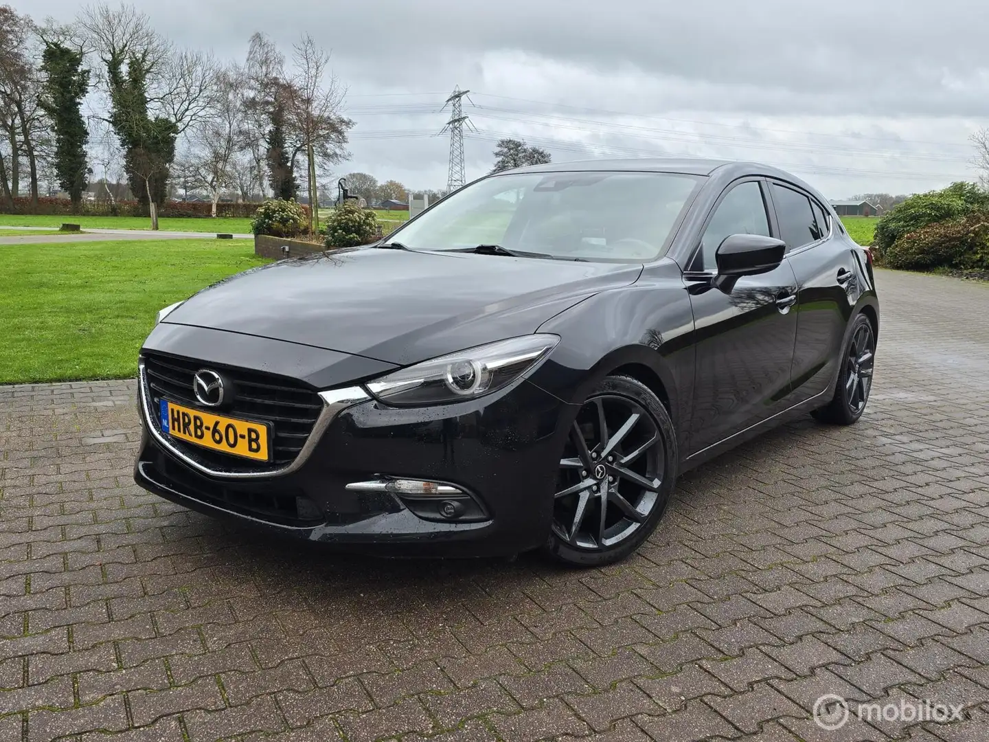 Mazda 3 2.0 SkyActiv-G 120 GT-M/AUTOMAAT/NAVI/18 INCH Zwart - 1