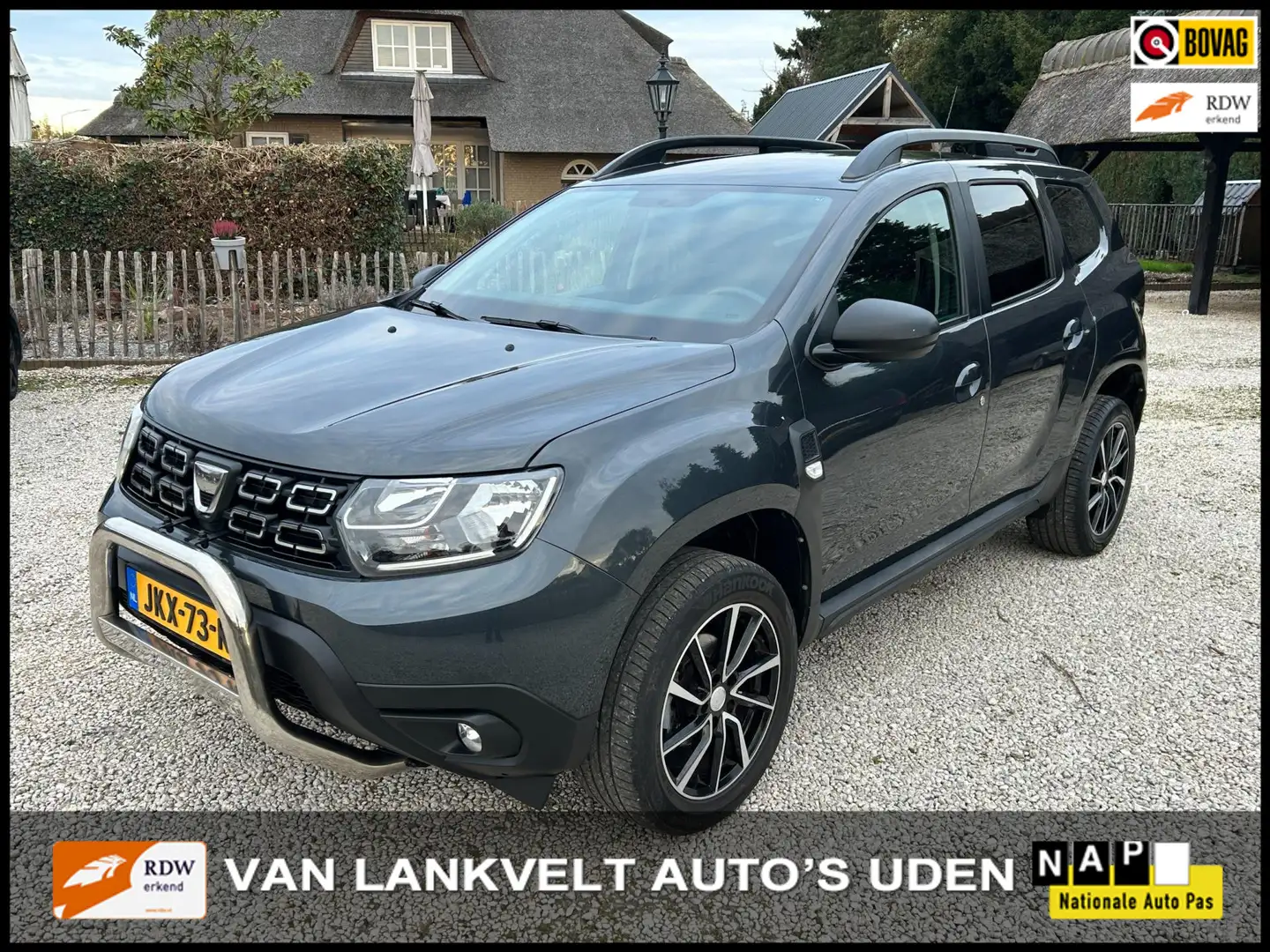 Dacia Duster 1.0 TCe Prestige airco, cruise, navi, camera Grau - 1