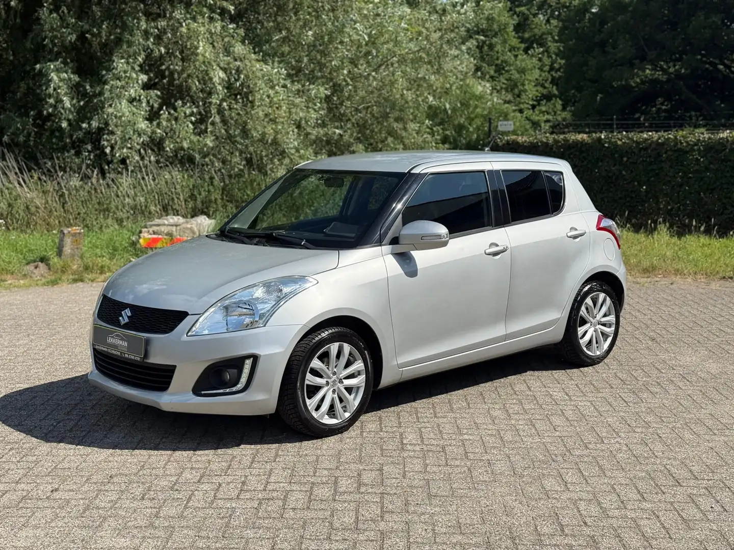Suzuki Swift 1.2 Exclusive EASSS CRUISE I KEYLESS I VOLL OPTIES Grijs - 1