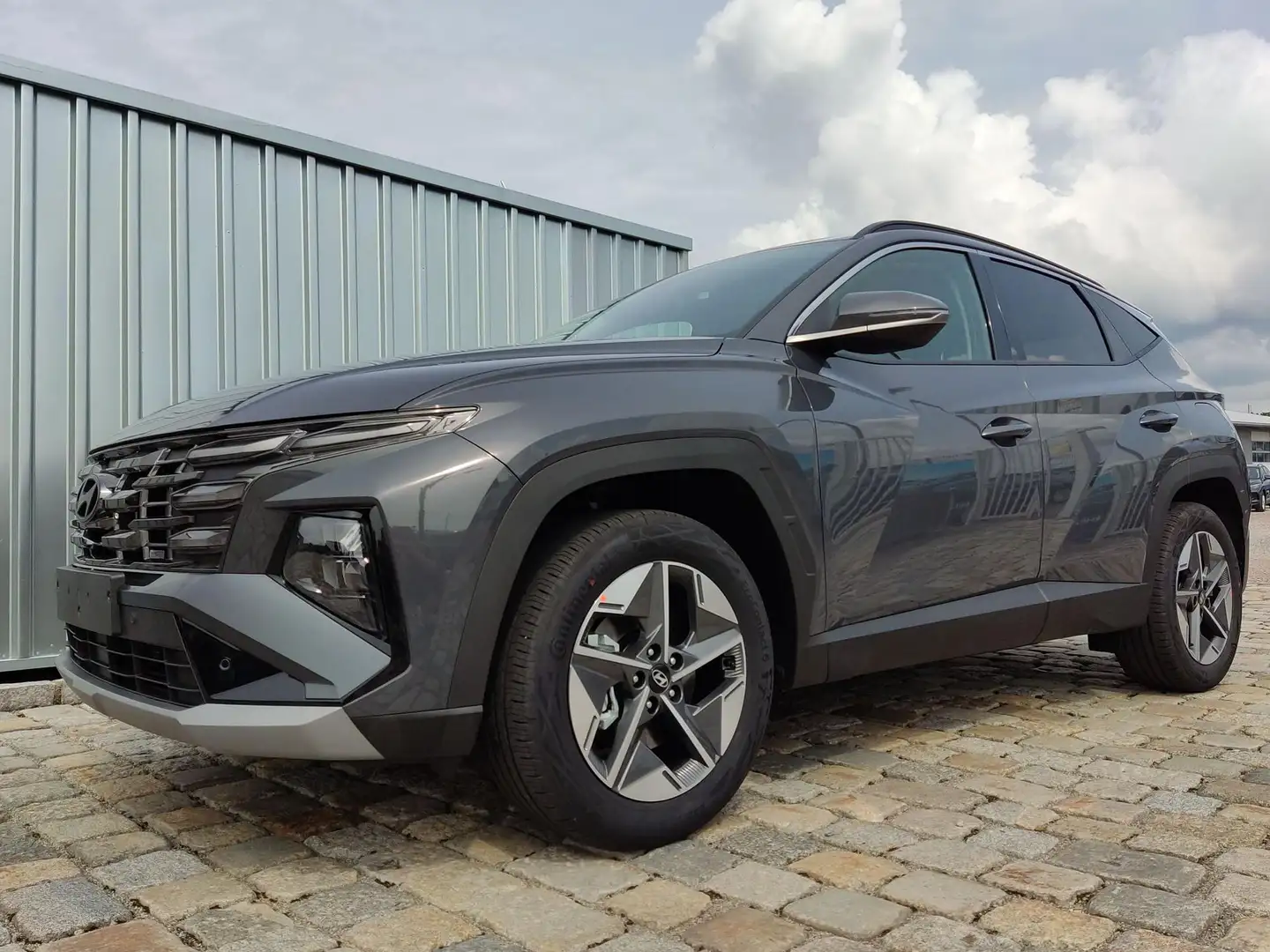 Hyundai TUCSON GO 1.6 T-GDI 2WD 7DCT Navi-18"-2 Zonen Klimaau... Grau - 1