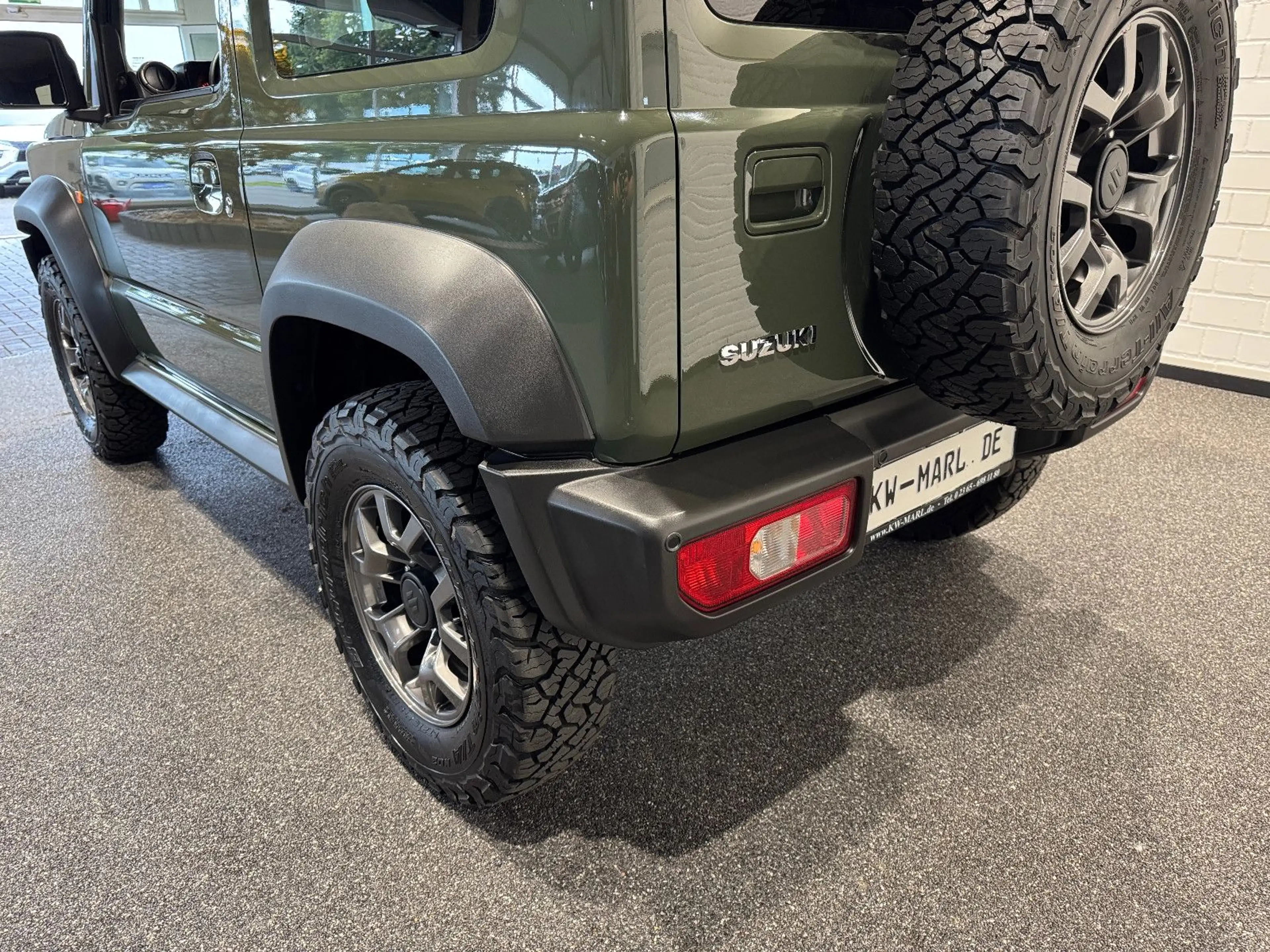 Suzuki Jimny Comfort+ AllGrip NAVI+CAM NEUWAGENZUSTAND! — photo 8