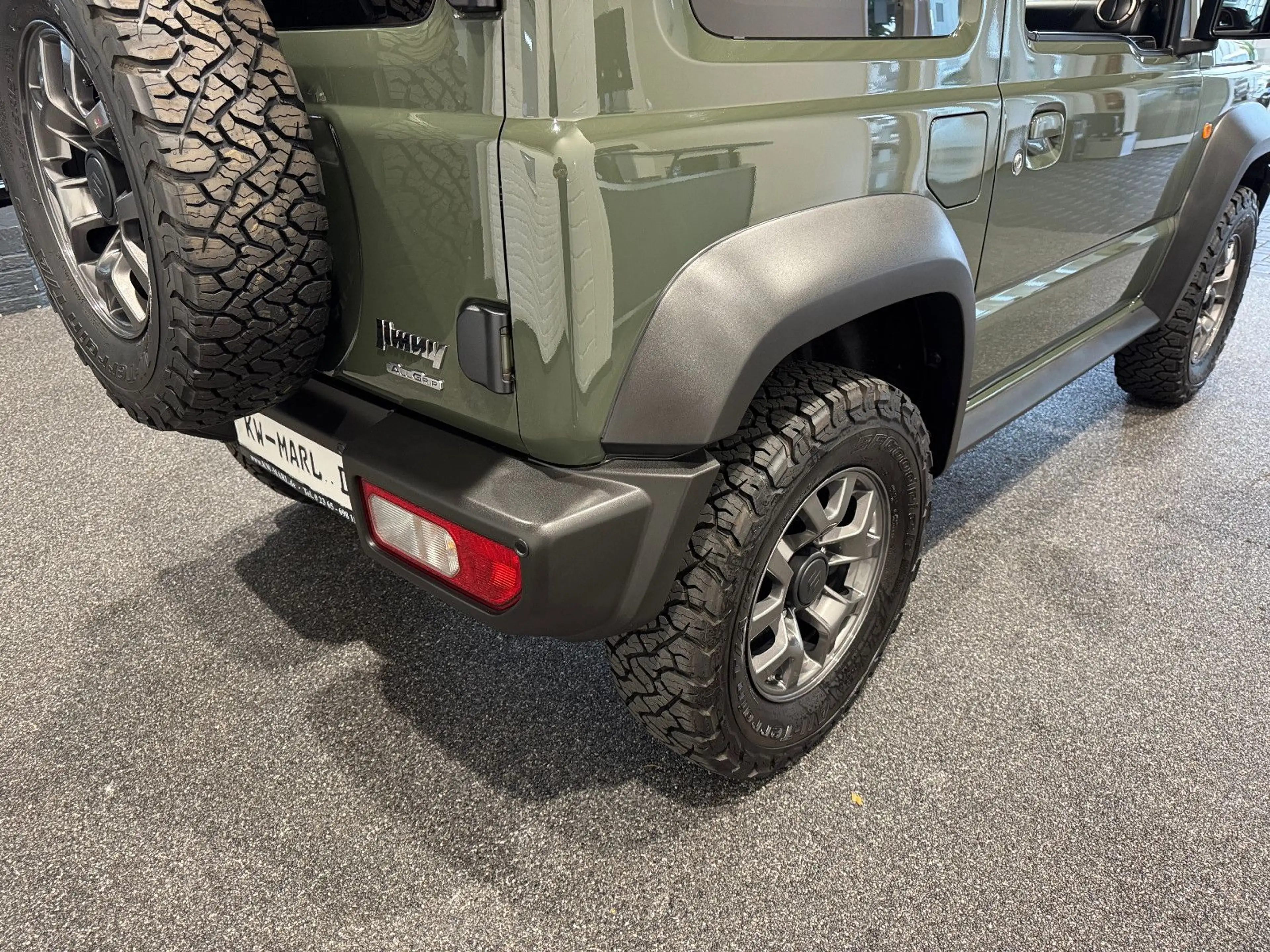 Suzuki Jimny Comfort+ AllGrip NAVI+CAM NEUWAGENZUSTAND! — photo 9