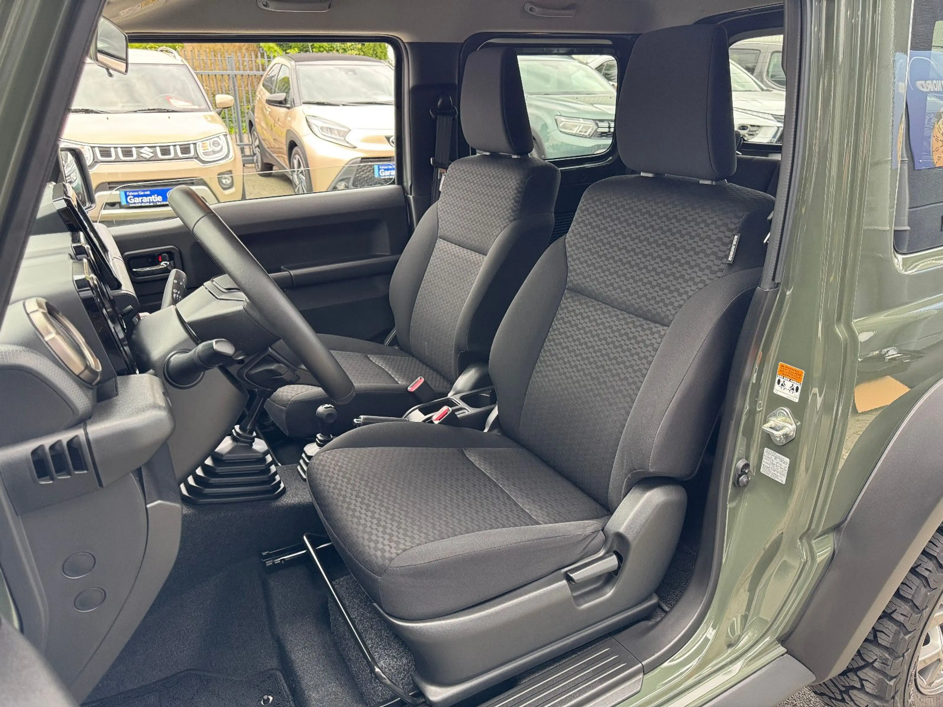 Suzuki Jimny Comfort+ AllGrip NAVI+CAM NEUWAGENZUSTAND! — photo 13