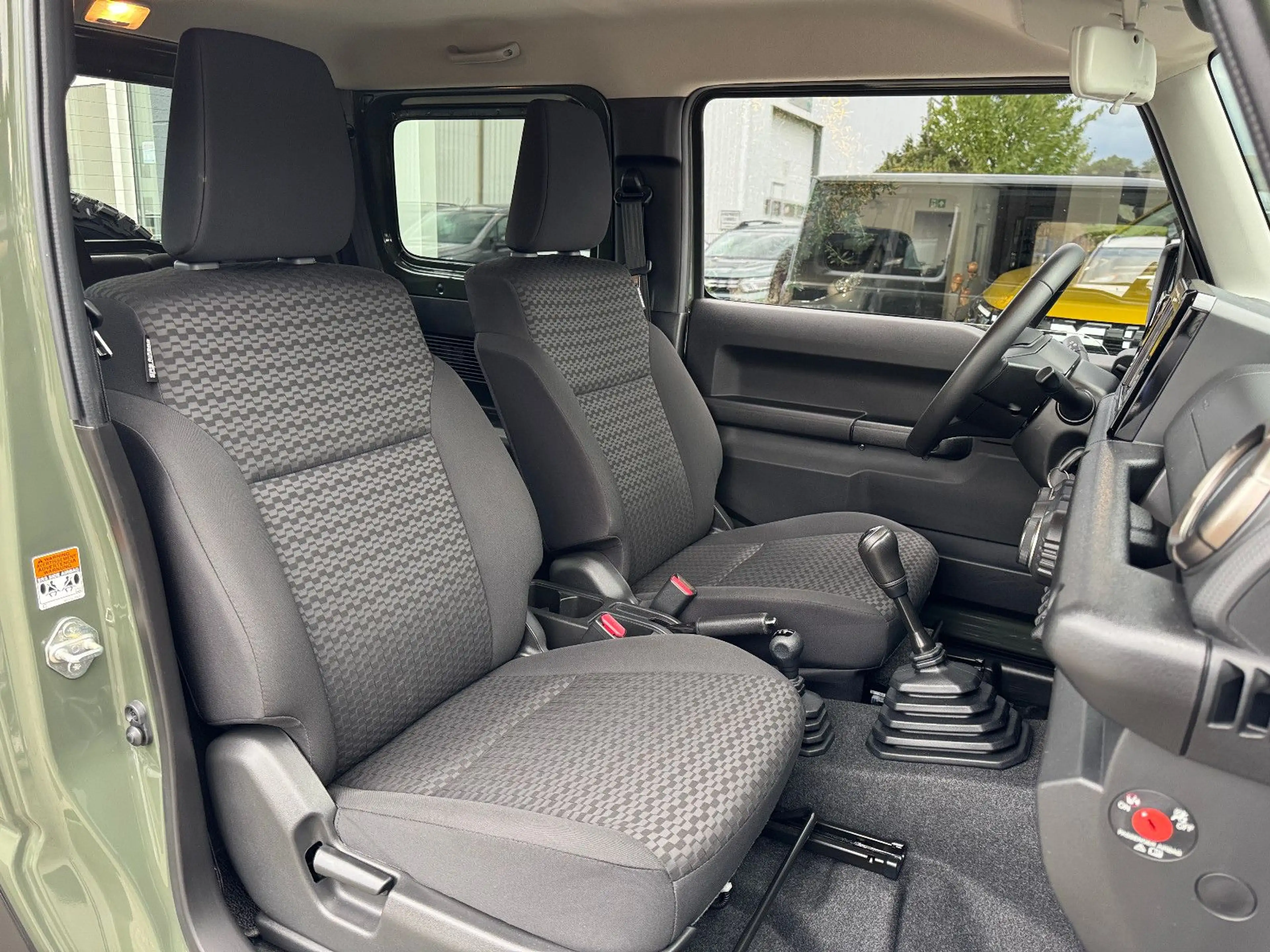 Suzuki Jimny Comfort+ AllGrip NAVI+CAM NEUWAGENZUSTAND! — photo 15
