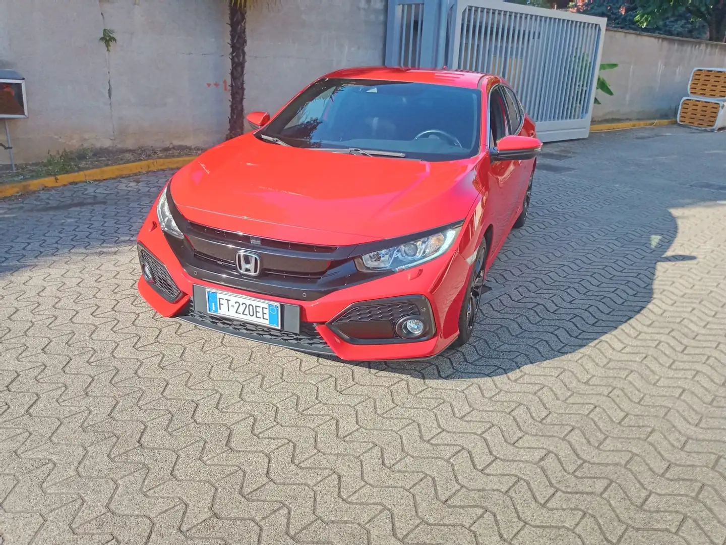 Honda Civic 5p 1.0 Elegance Navi Rood - 1