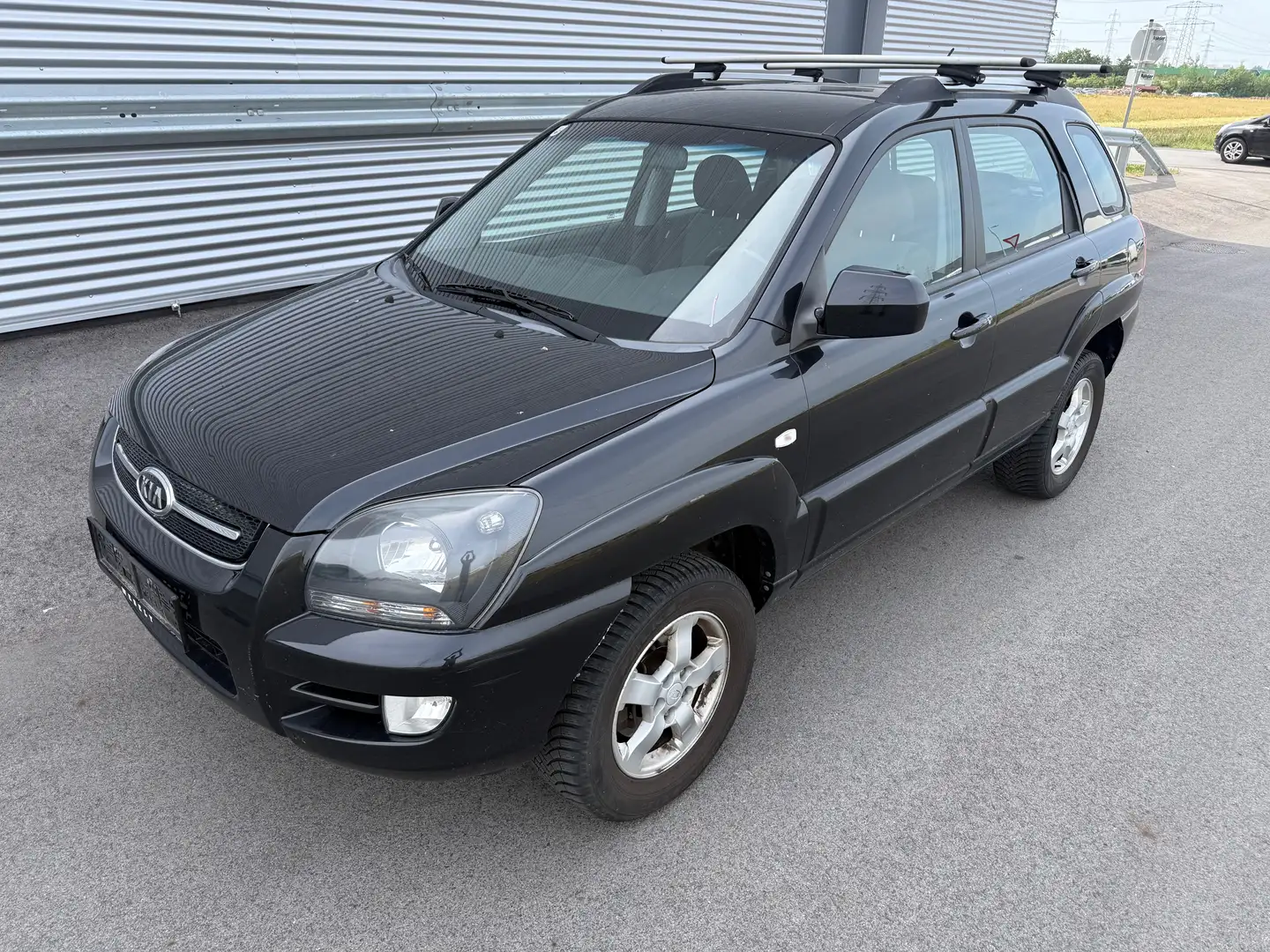 Kia Sportage Motion 2,0 DOHC 2WD ID:28 Zwart - 1