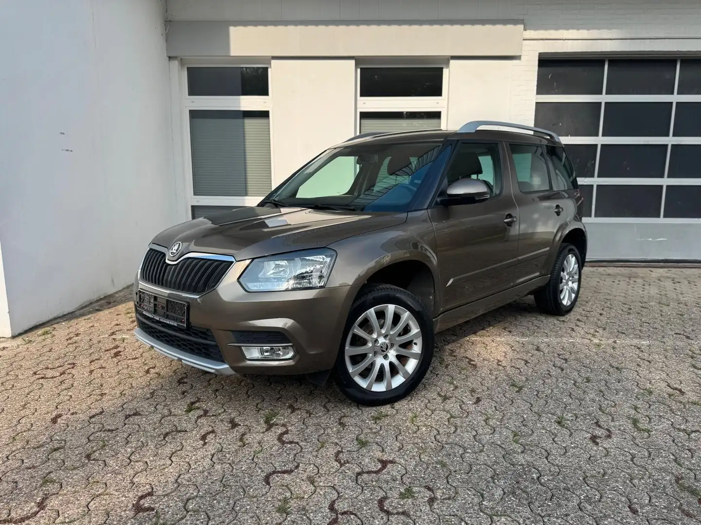 Skoda Yeti 1.4 TSI Ambition PDC Bluetooth Sitzhzg. TOP Braun - 1