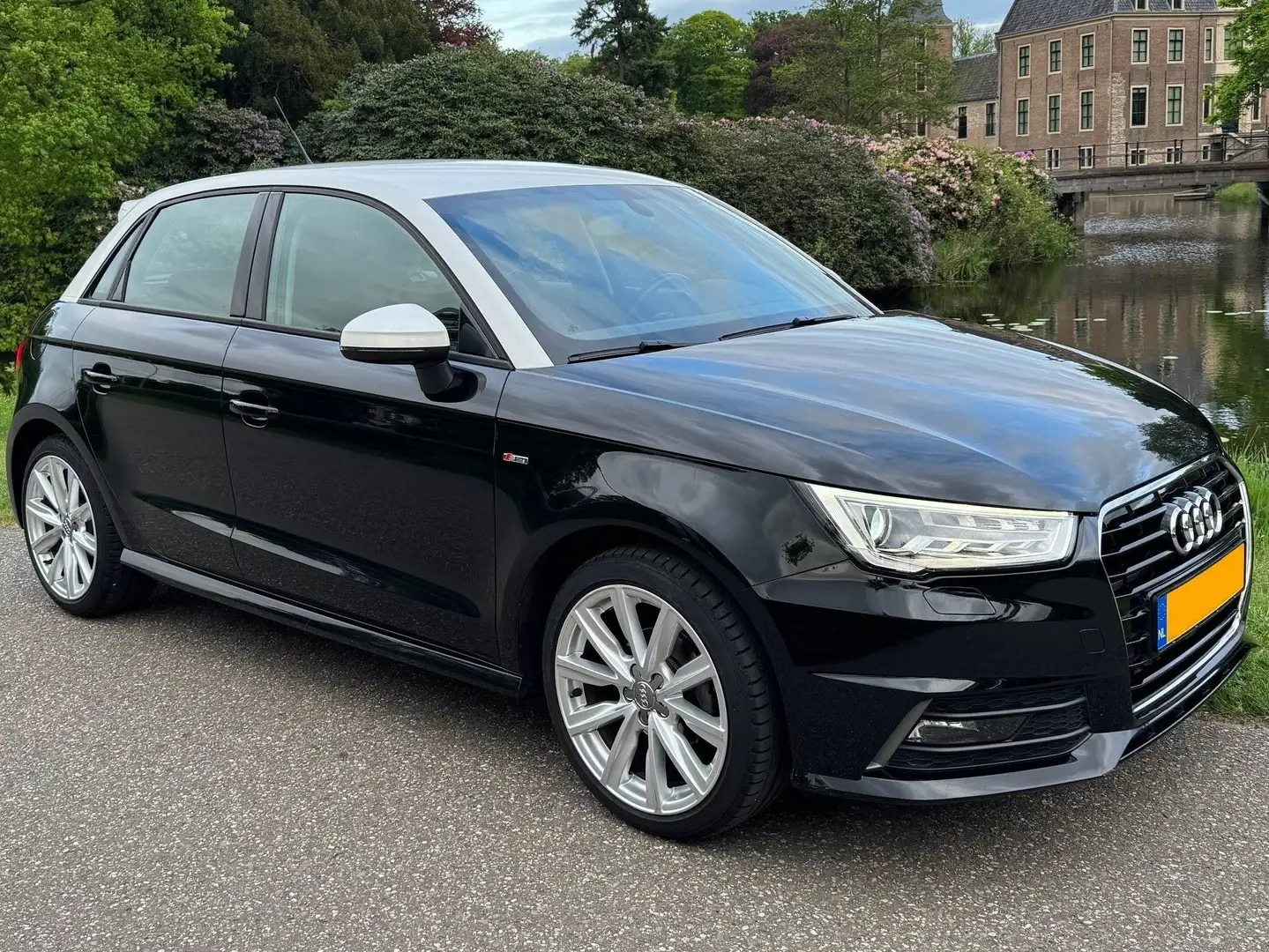 Audi A1 A1 Sportback 1.0 TFSI S-Line Admired 70Kw DSG Zwart - 1