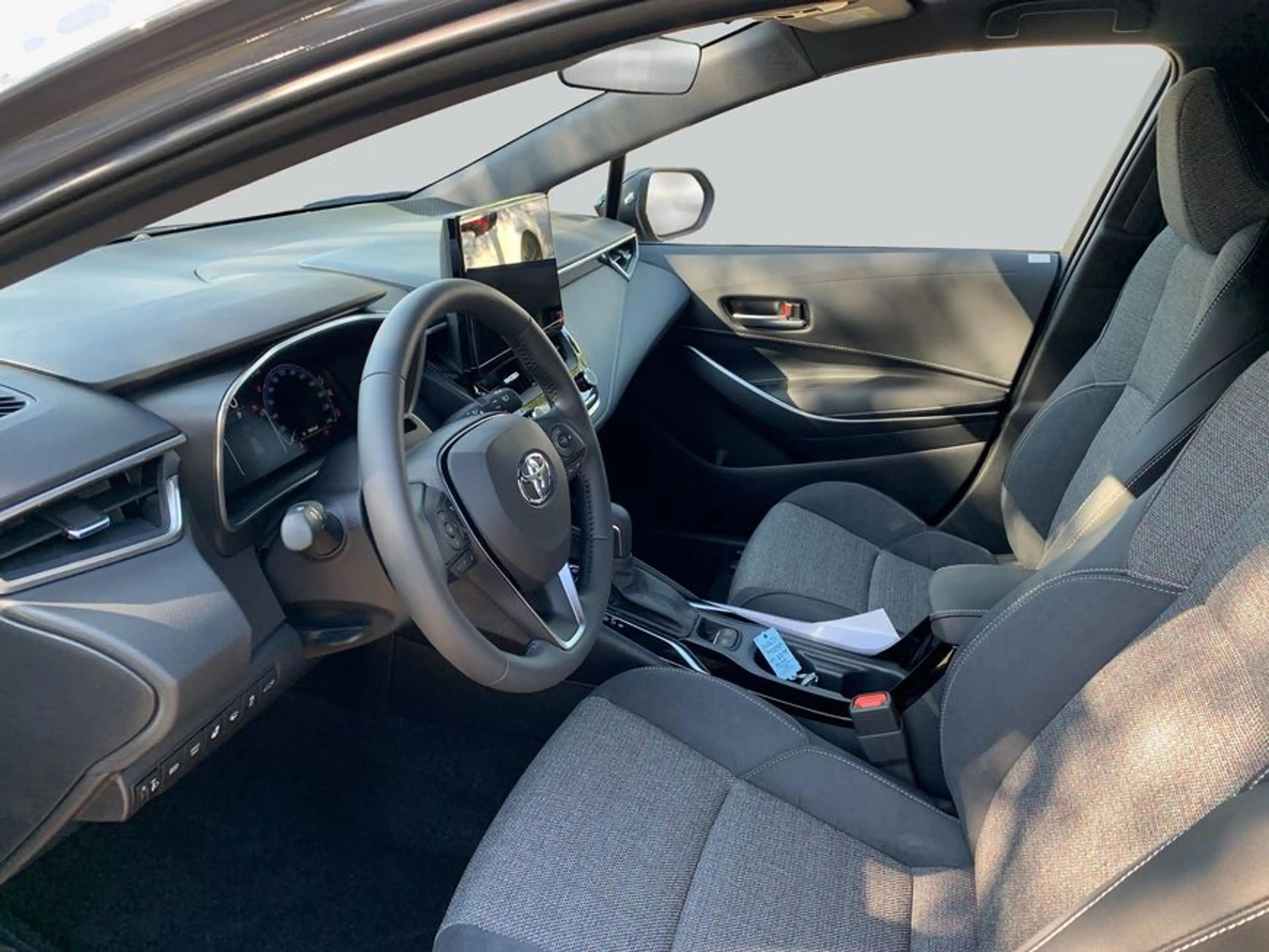 Toyota Corolla 1.8 Hybrid Touring Sports Teamplayer 72 kW — photo 9