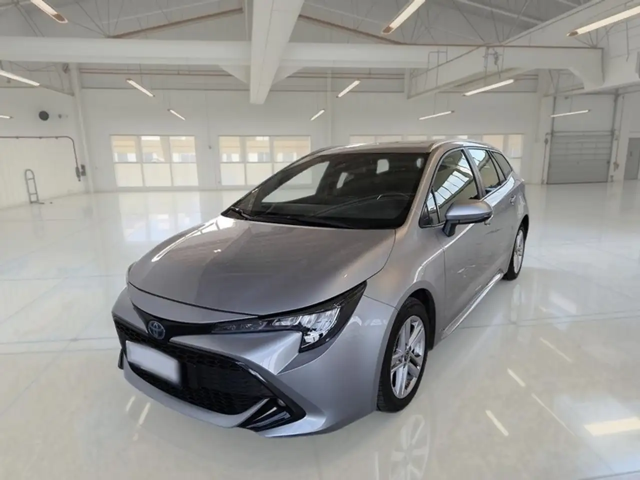 Toyota Corolla TS 1.8 HYBRID BUSINESS AUTO STATION WAGON — photo 1 of 11