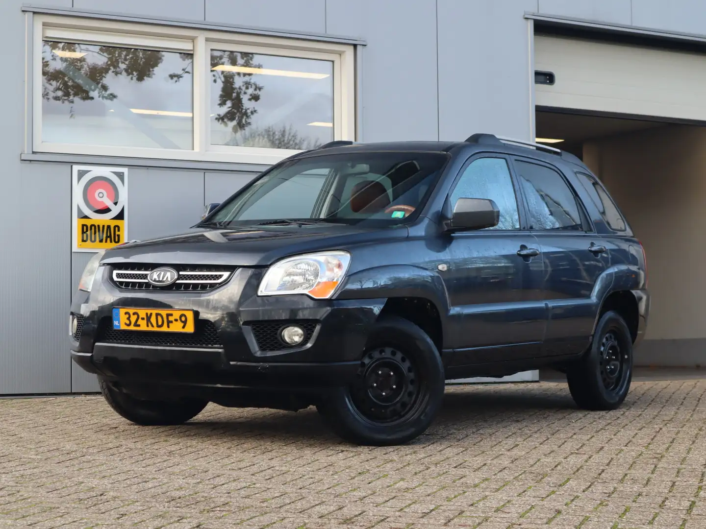 Kia Sportage 2.0 CVVT Fifteen 4WD / geen apk, rijd en schakelt Grijs - 1