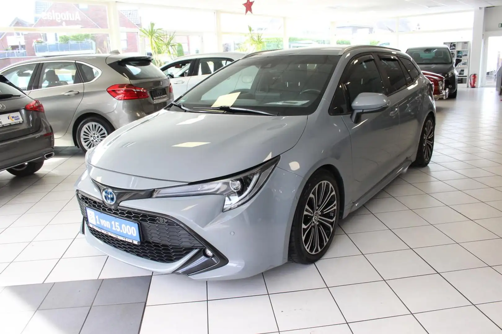Toyota Corolla 2.0 Hybrid Team Sport Grau - 1