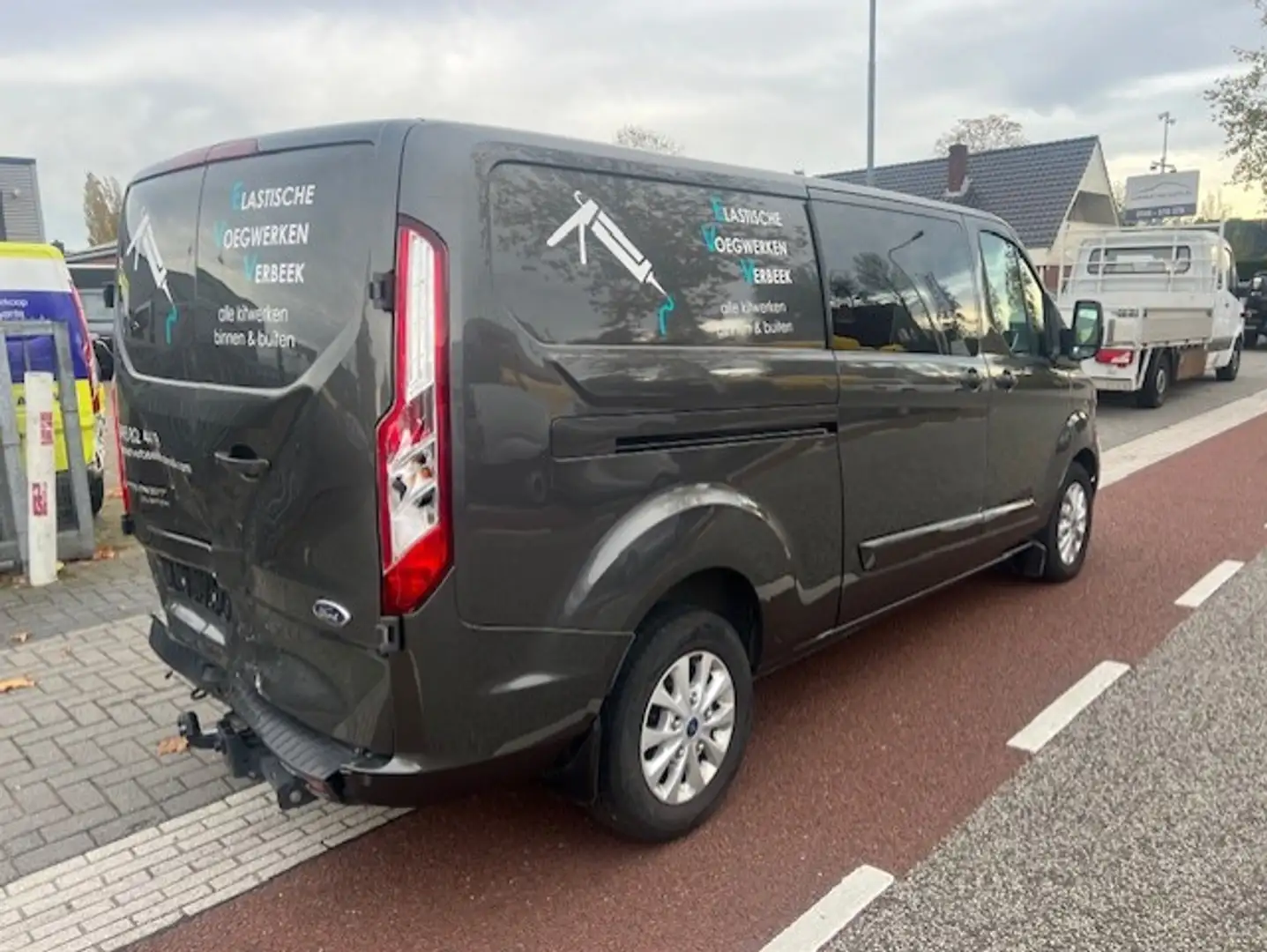 Ford Transit Custom 300 2.0 TDCI L2H1 125kw DC 5P LANG AUTOM. AIRCO KL Grijs - 2