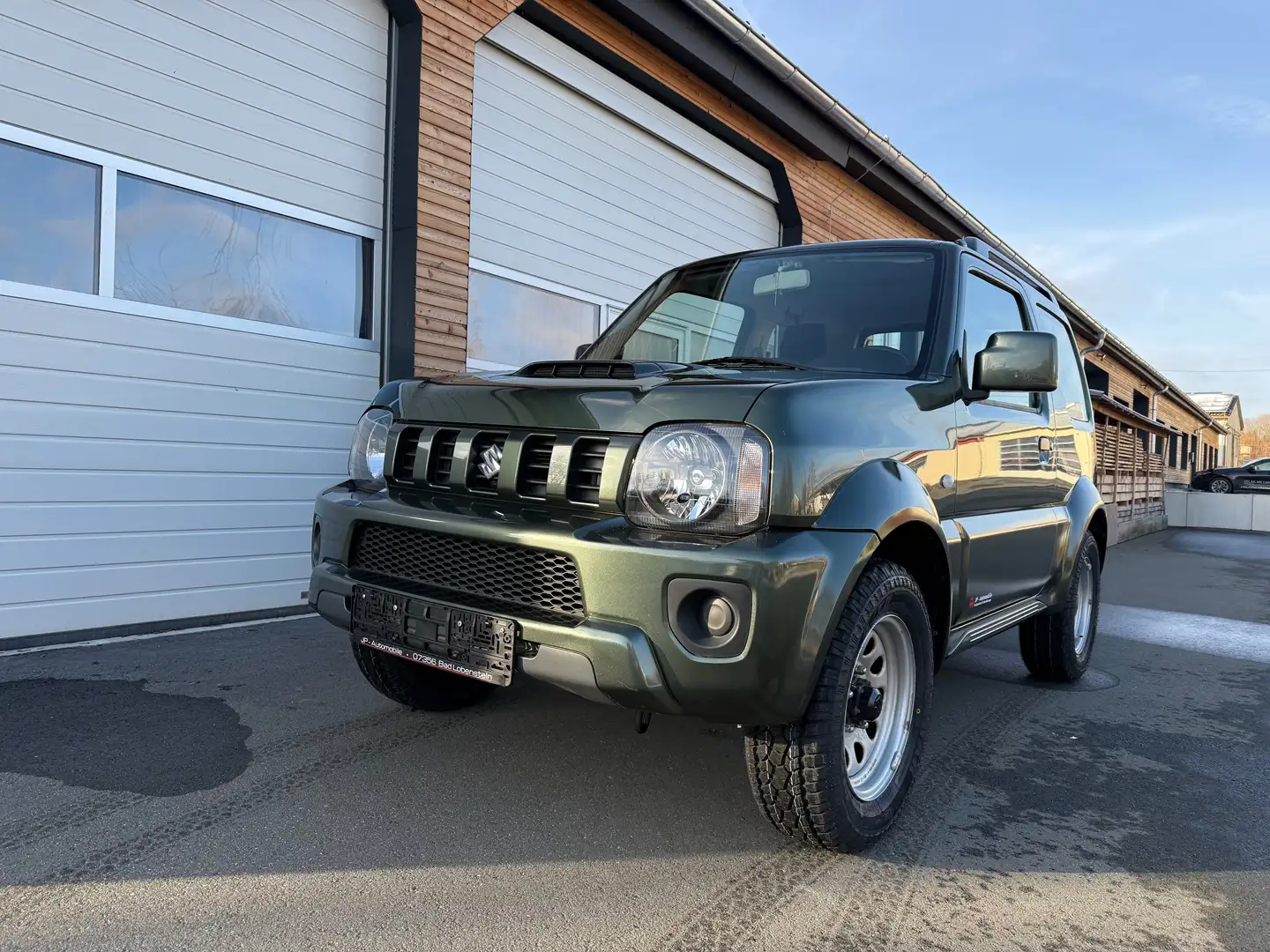 Suzuki Jimny Jimny Comfort Ranger Klima AHK Top Grün - 1