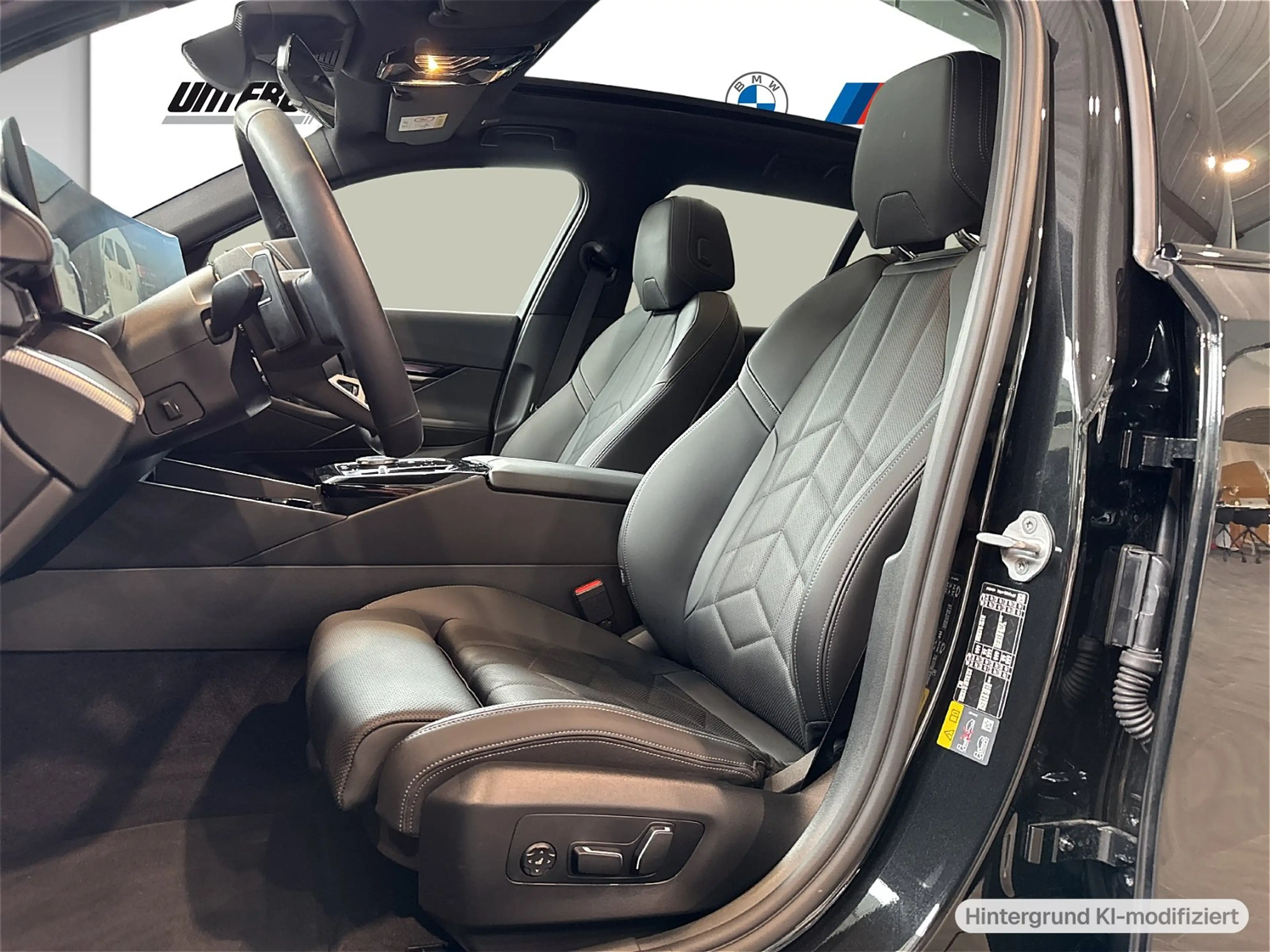 BMW 550 e xDrive Touring — photo 10