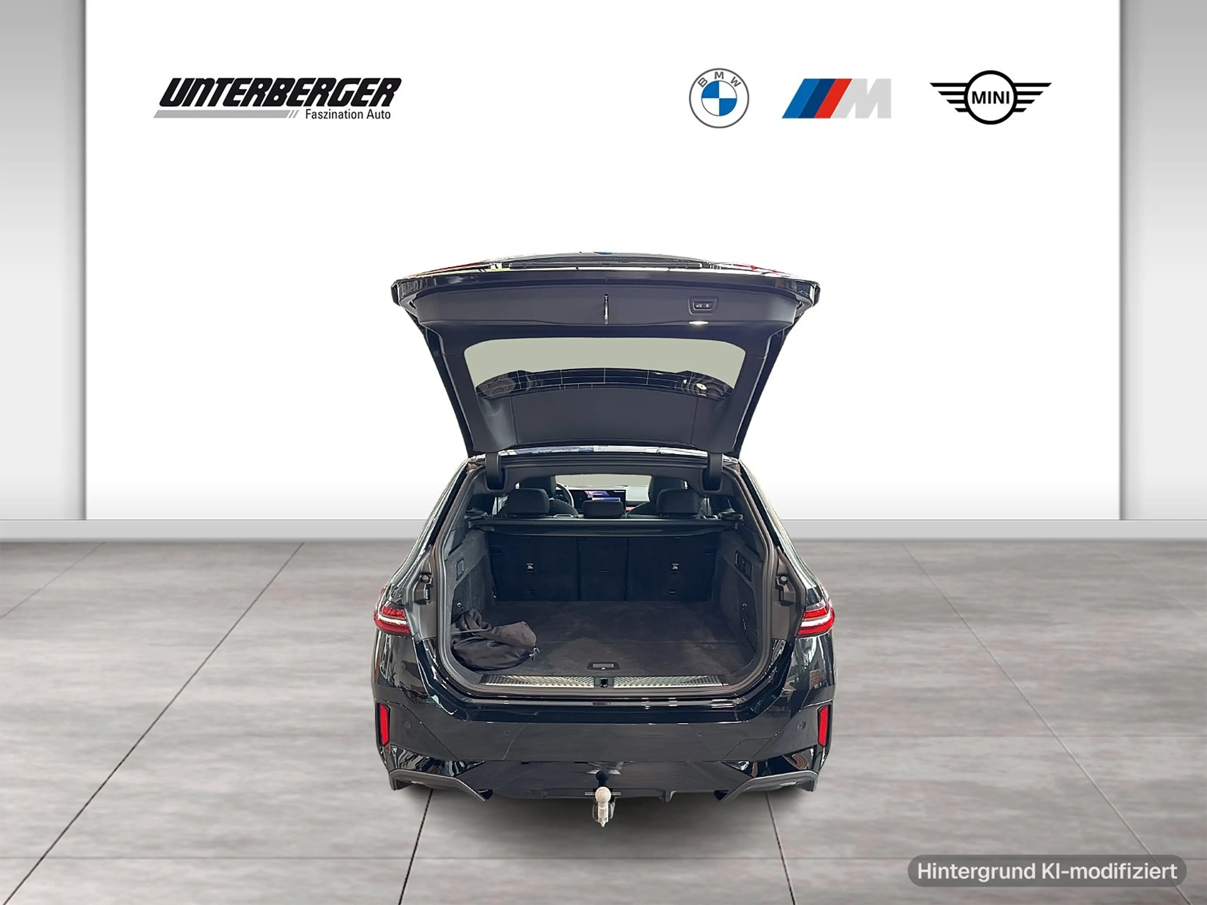 BMW 550 e xDrive Touring — photo 12