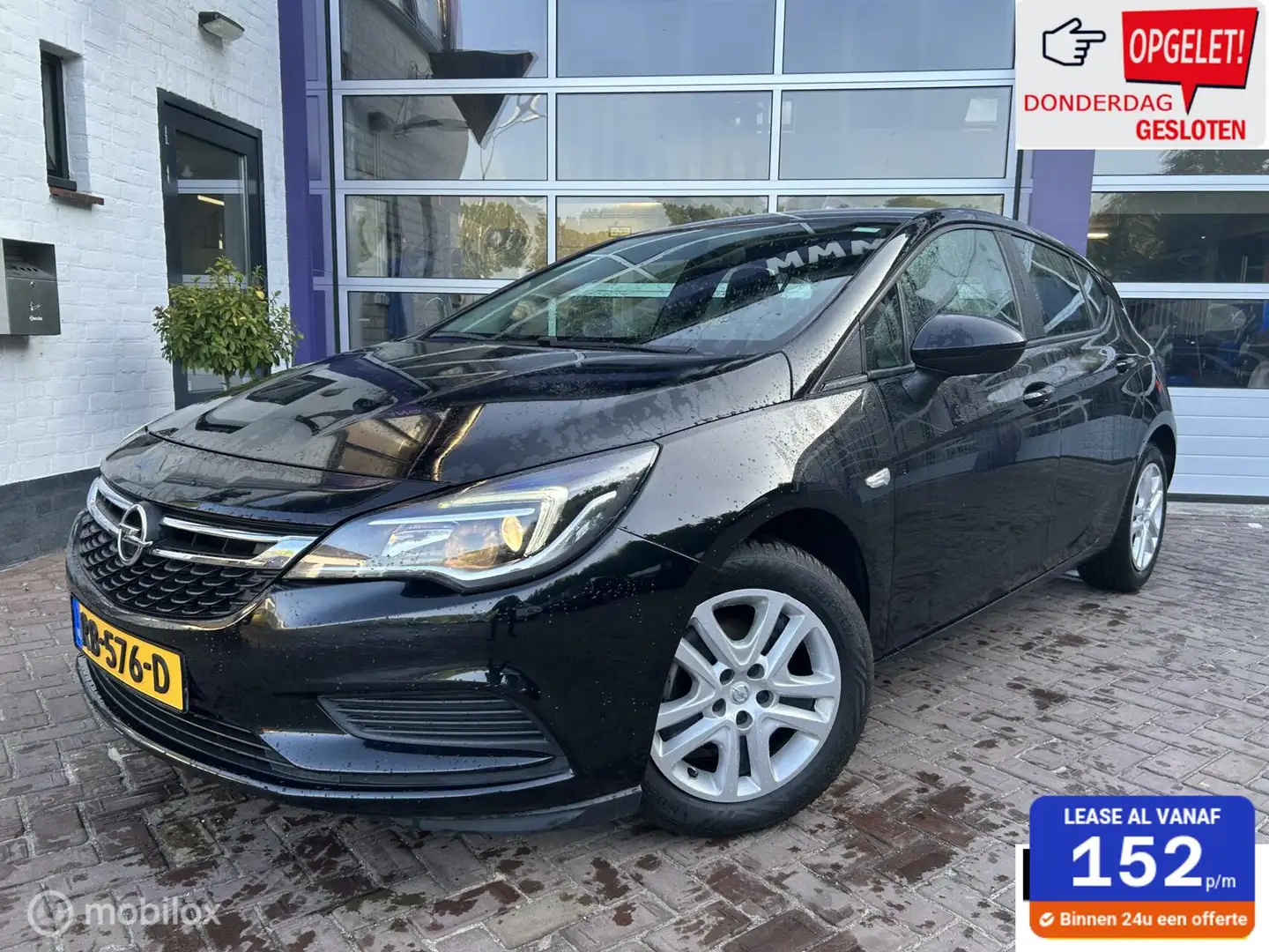 Opel Astra 1.0 Business+ * AIRCO * NAVIGATIE * TREKHAAK * Zwart - 1