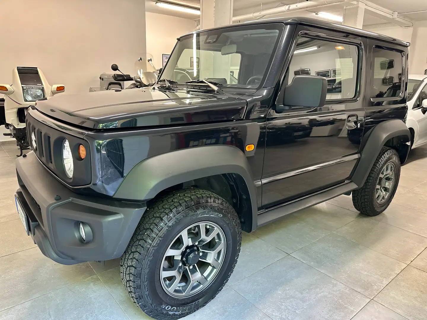 Suzuki Jimny 4 POSTI  * UNIPROP * APPLE CARPLAY * BOOK SERVICE Nero - 1