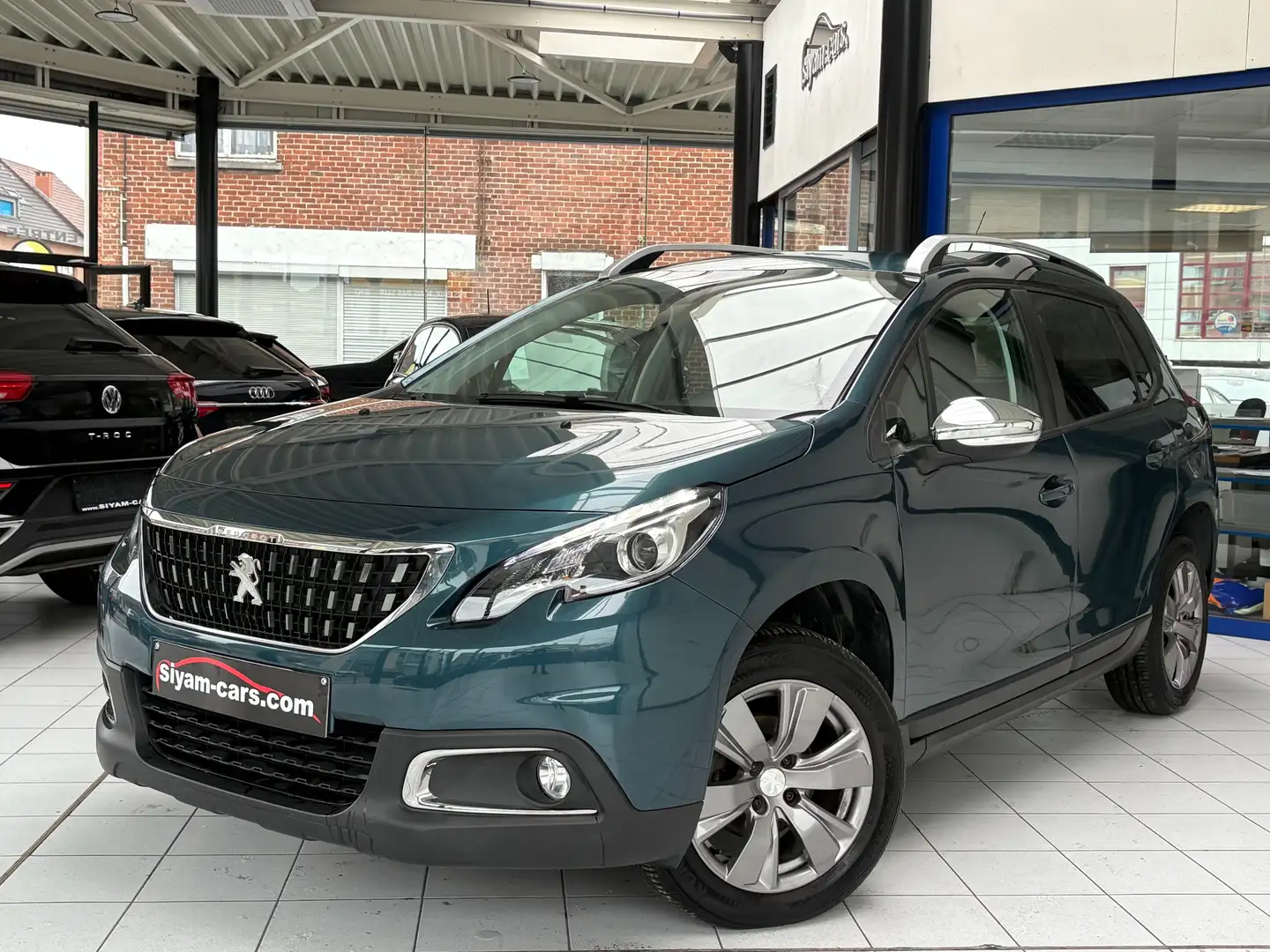 Peugeot 2008 1.2i *STYLE*GPS*CLIM DIGI*PDC*CARPLAY*JANTES* Blauw - 1