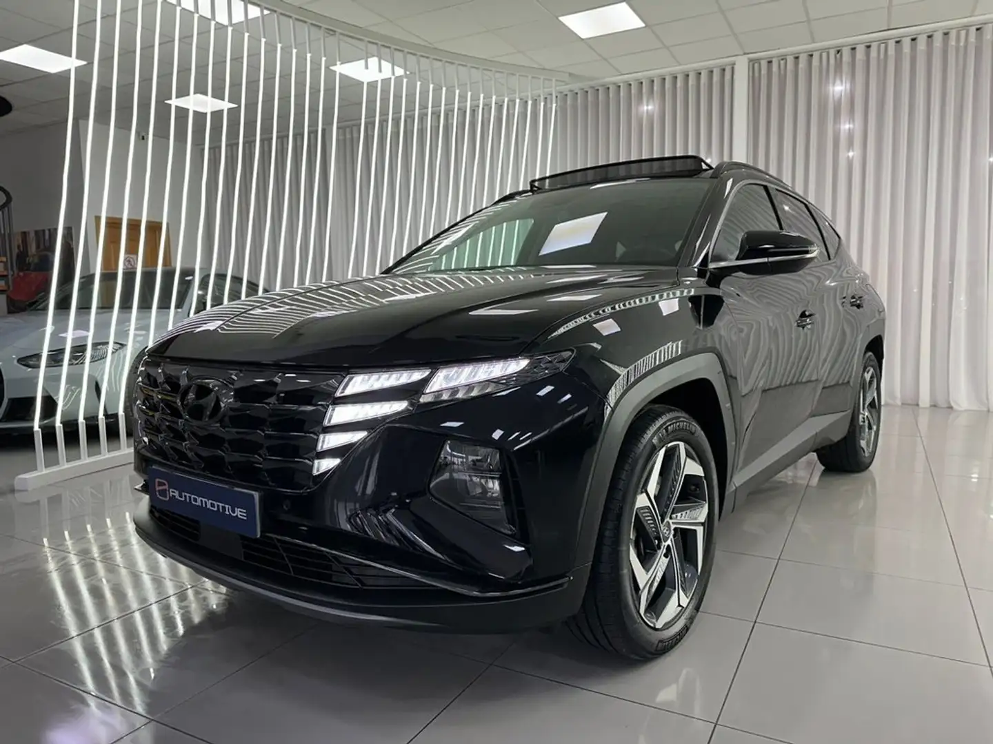 Hyundai TUCSON 1.6 TGDI PHEV Tecno Sky AT Negro - 1