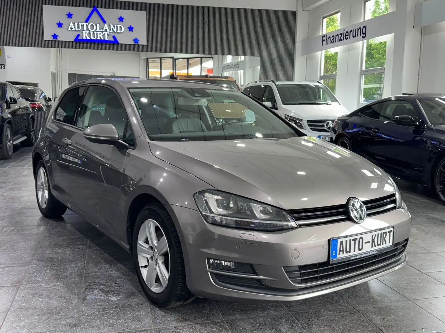 Volkswagen Golf 1,4 TSI Comfortline*Navi*Xenon*T.Leder*DSG Grau - 1