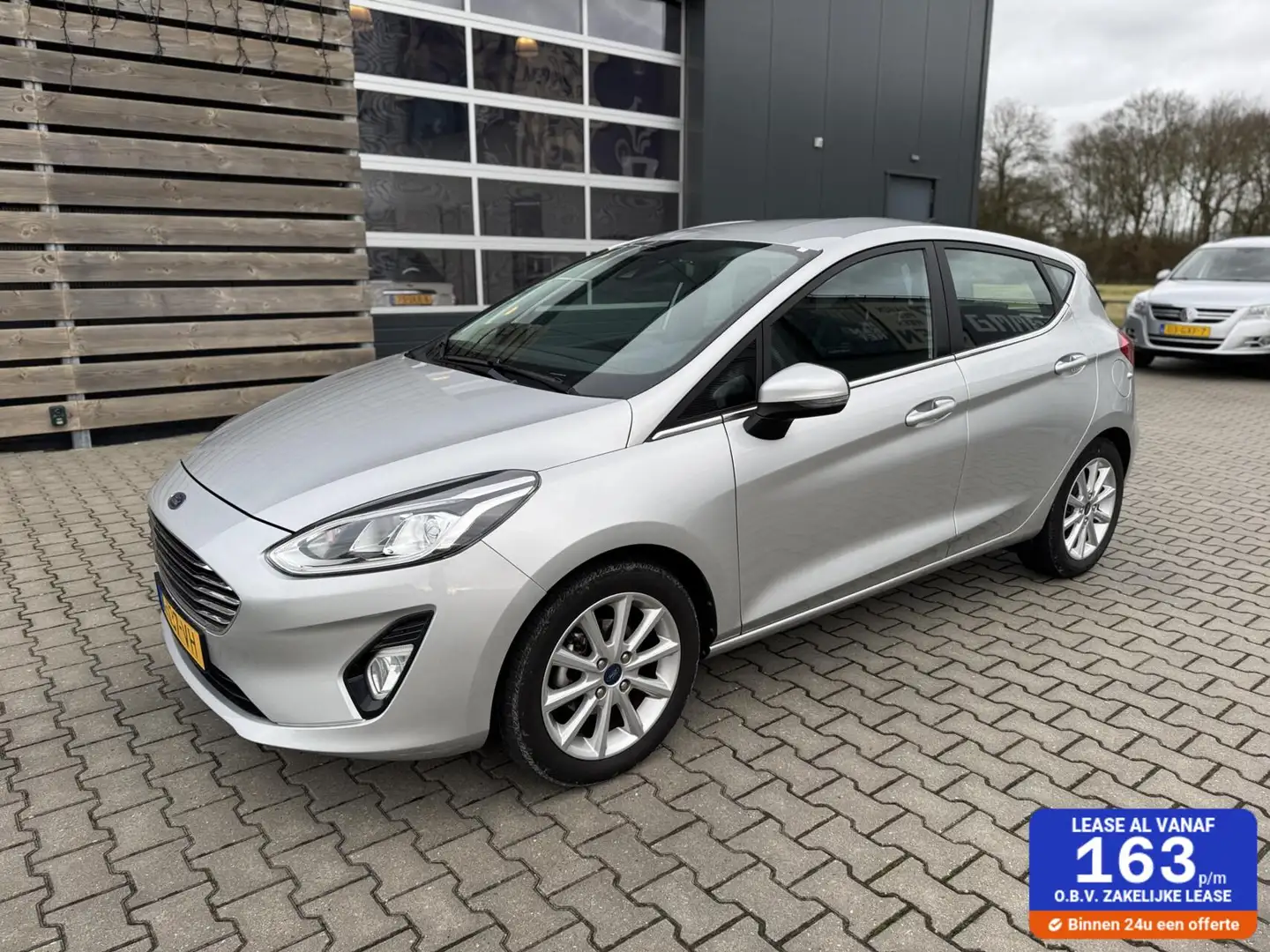 Ford Fiesta 1.0 EcoBoost Titanium|CarPlay|ECC|PDC|Cruise Contr Grijs - 1