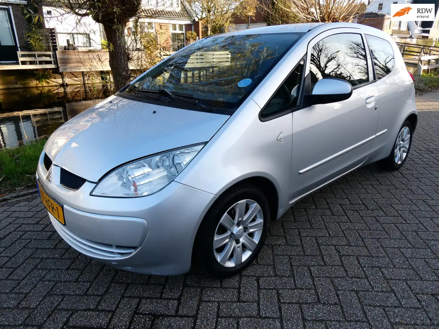 Mitsubishi Colt 1.3 Invite+ 95pk 4-Cilinder Airco Degelijke Jap Yo Grijs - 1