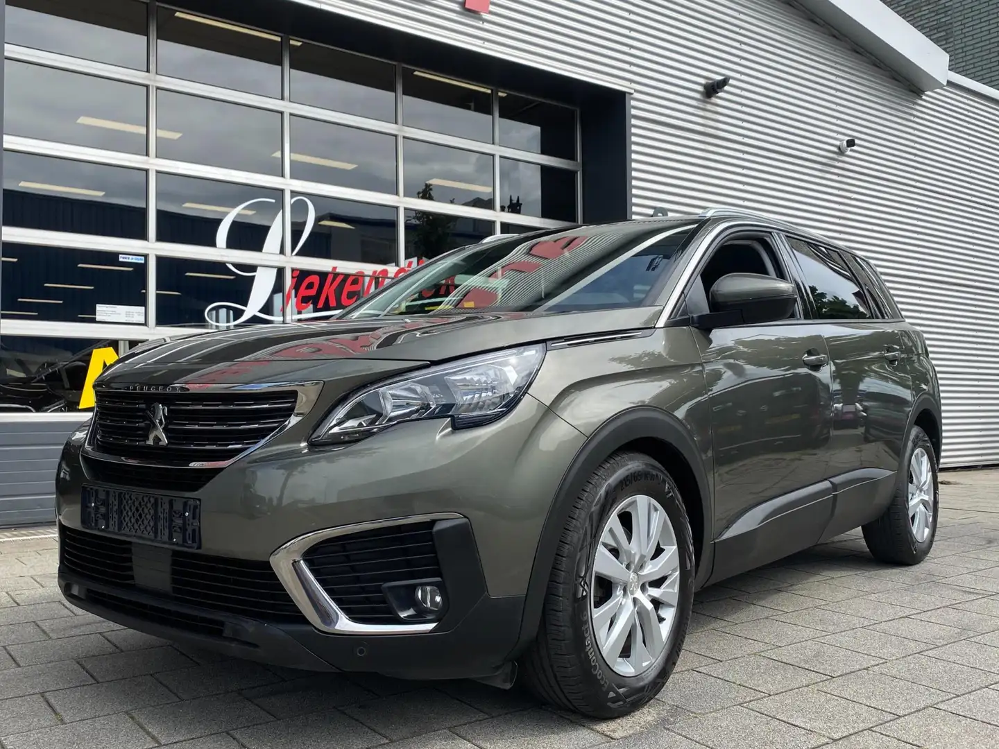 Peugeot 5008 1.2 PureTech 7 Personen - AUTOMAAT - Navigatie/App Grigio - 1