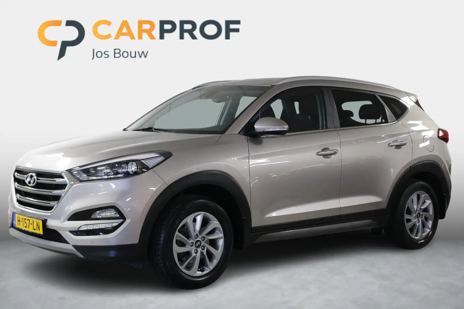 Hyundai TUCSON 1.6 GDi Comfort Clima | Stoelverw. | Trekhaak | Ca Braun - 1