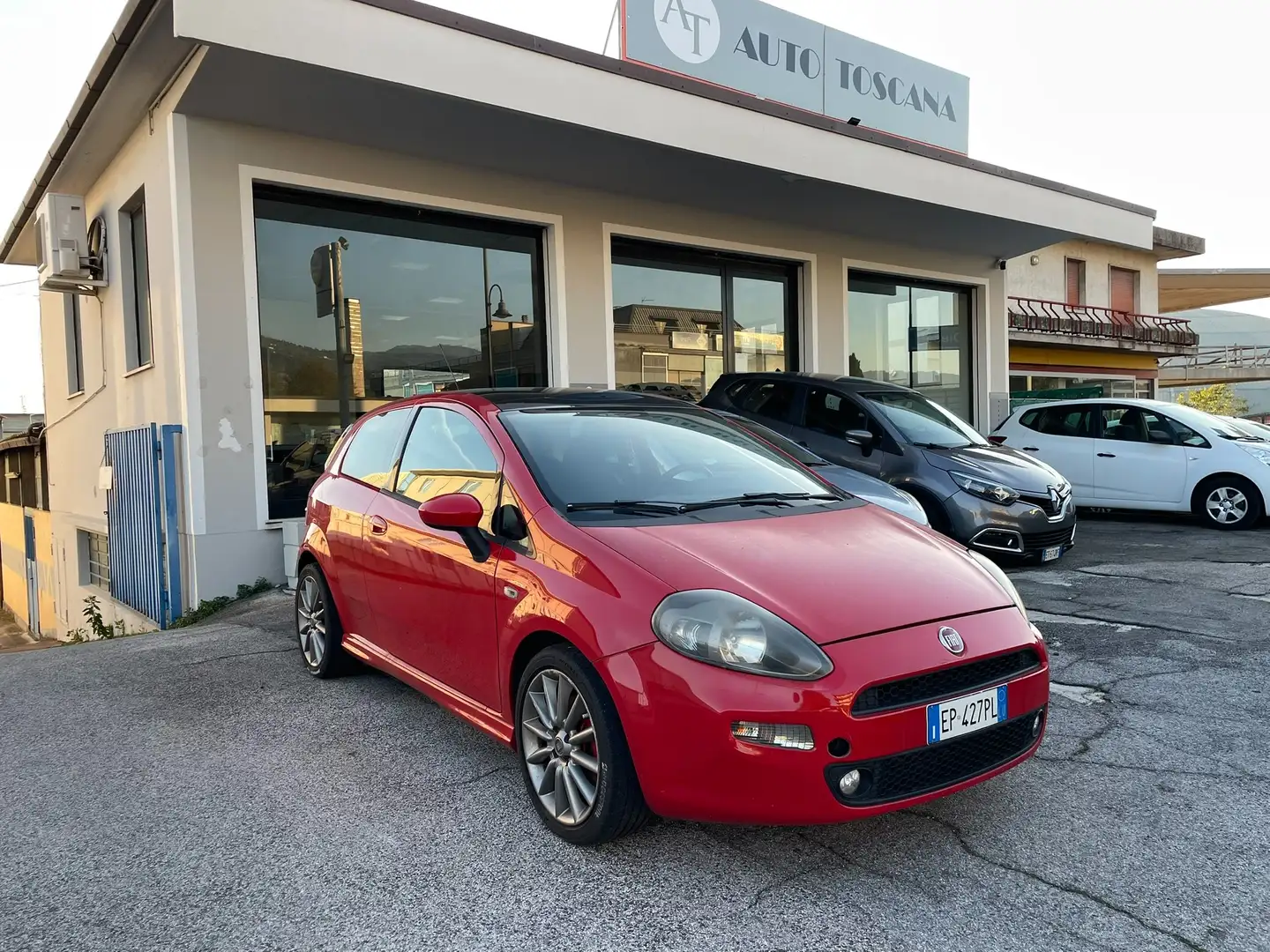 Fiat Punto Punto 3p 1.4 m-air 16v t. Sport s Rojo - 2