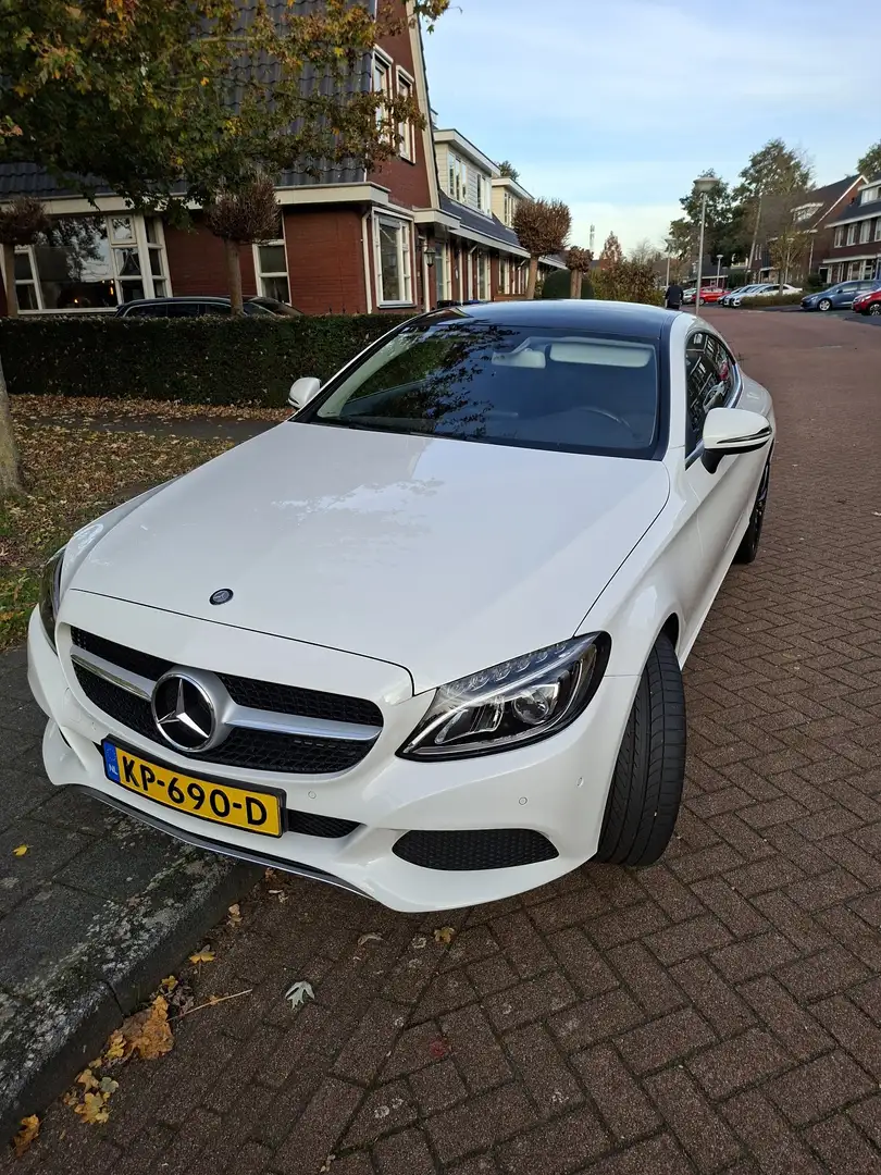 Mercedes-Benz C 180 Ambition nieuwstaat dealer auto NU AANBIEDING Wit - 1