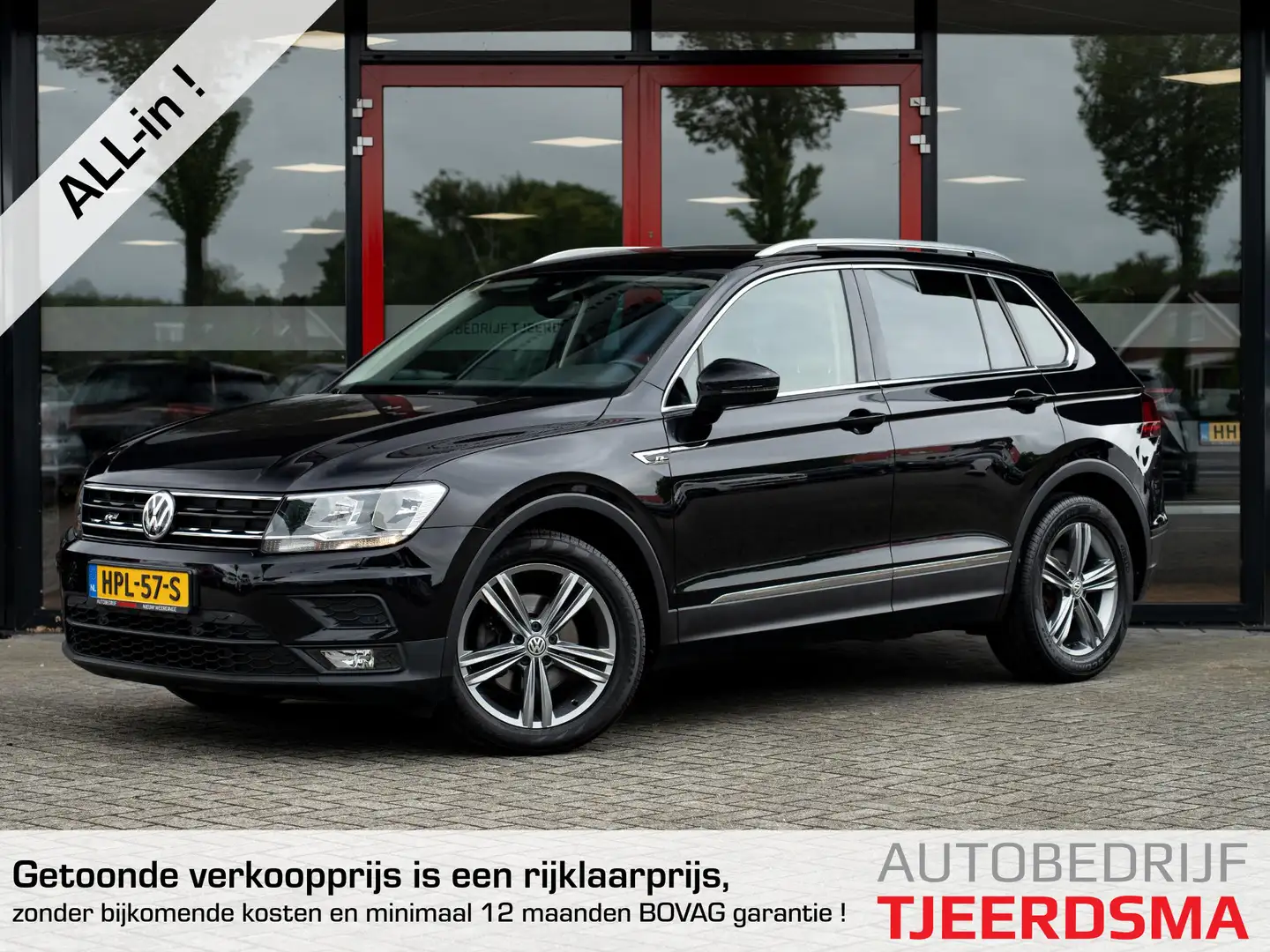 Volkswagen Tiguan 1.4 TSI Comfortline Business | Navigatie | Climate Zwart - 1
