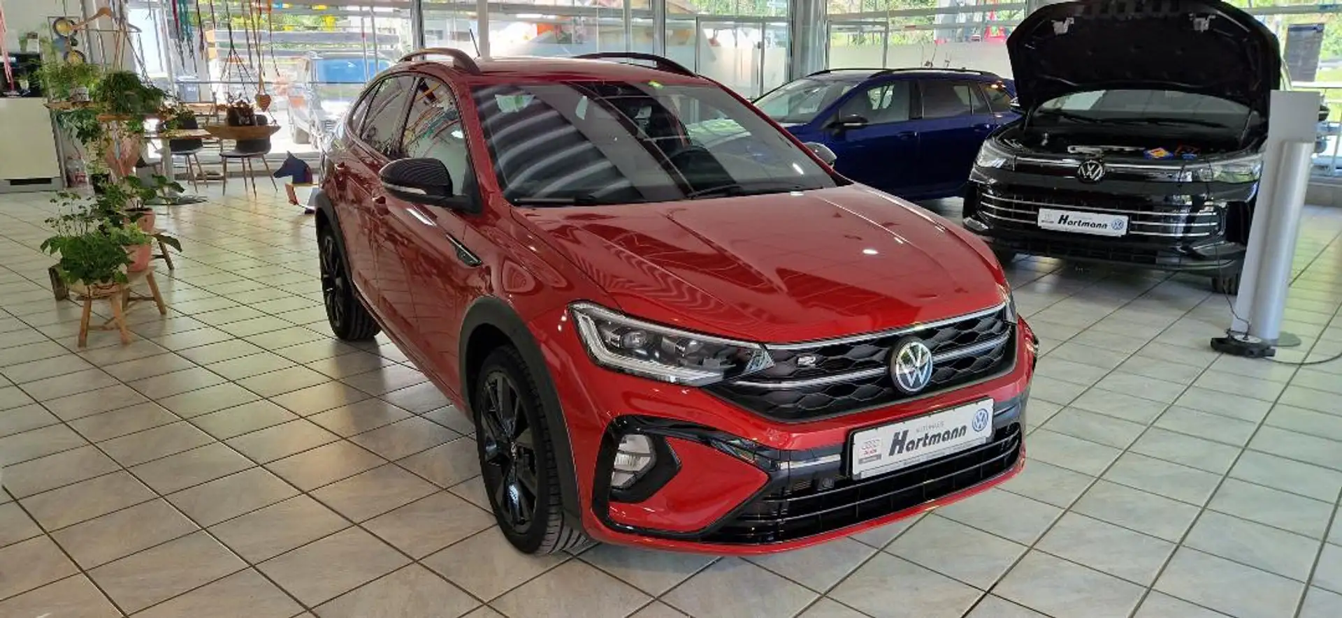 Volkswagen Taigo R-Line 1,5TSI DSG BlackStyle Matrix AHK APP Klima Sitzh Rot - 1
