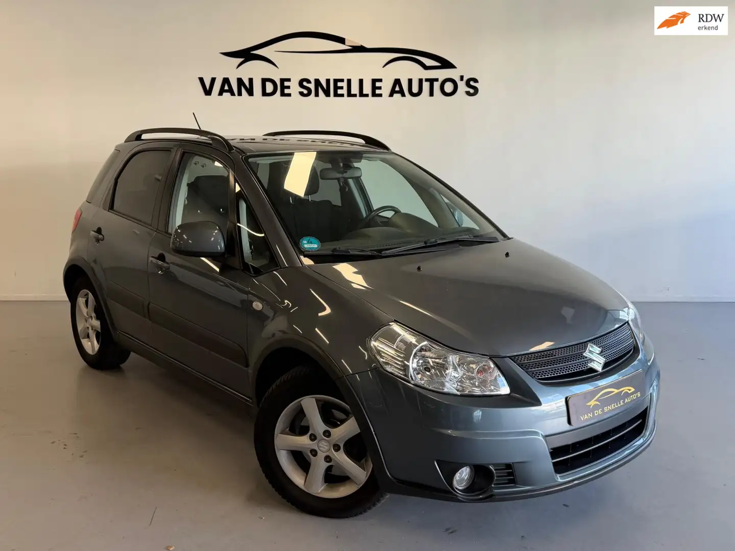 Suzuki SX4 1.6 Comfort KEYLESS/AIRCO/STOELVERWARMING Grijs - 1