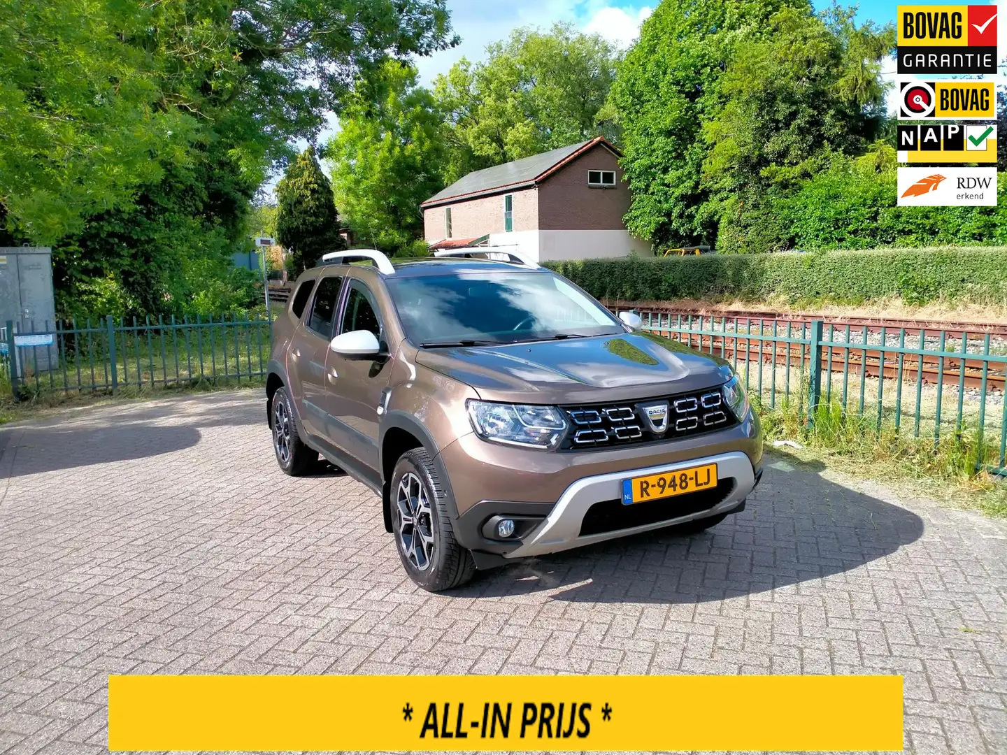 Dacia Duster 1.3 TCe 150 pk Prestige 360gr cam leder carplay tr Bruin - 1