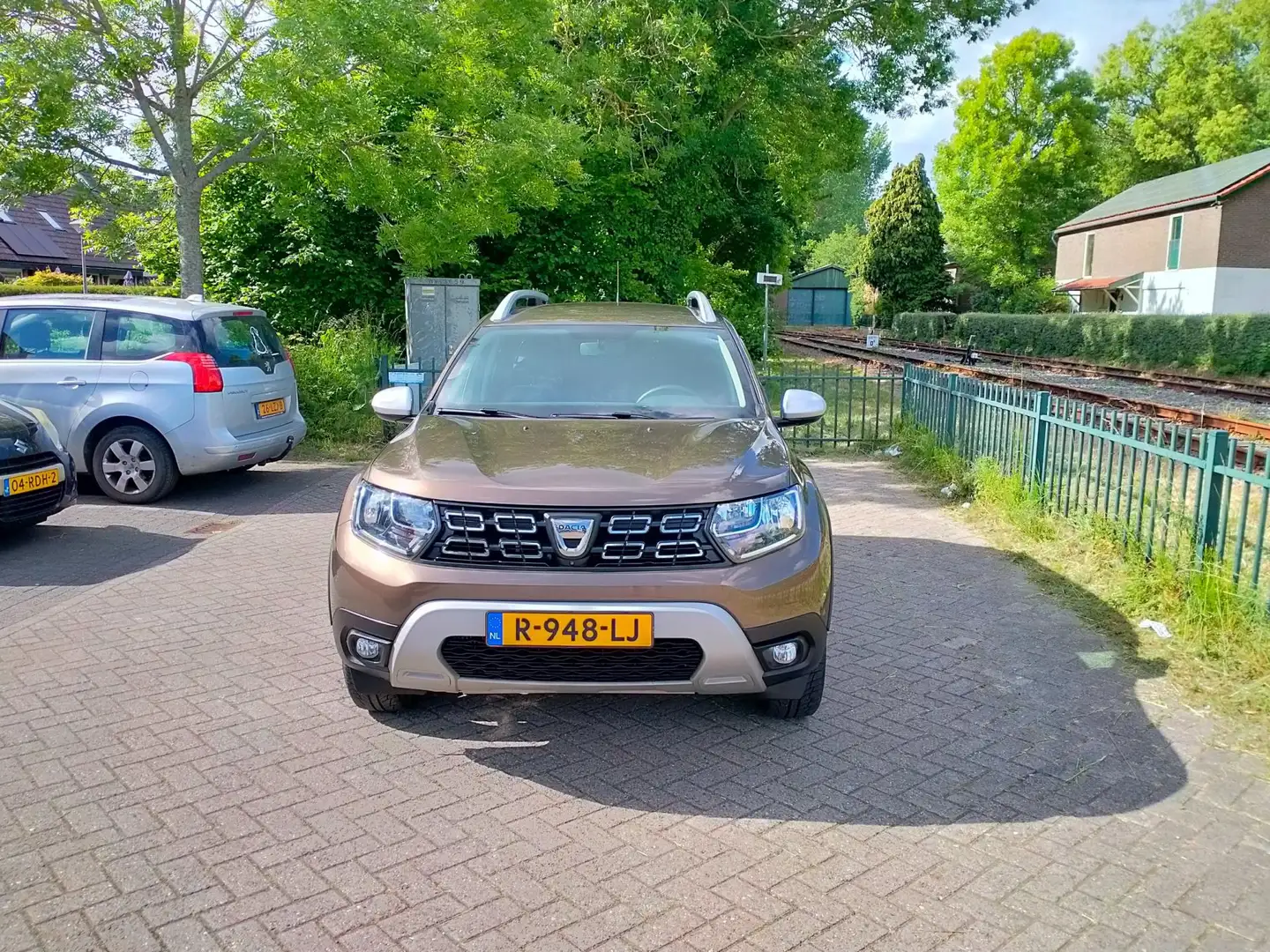 Dacia Duster 1.3 TCe 150 pk Prestige 360gr cam leder carplay tr Bruin - 2
