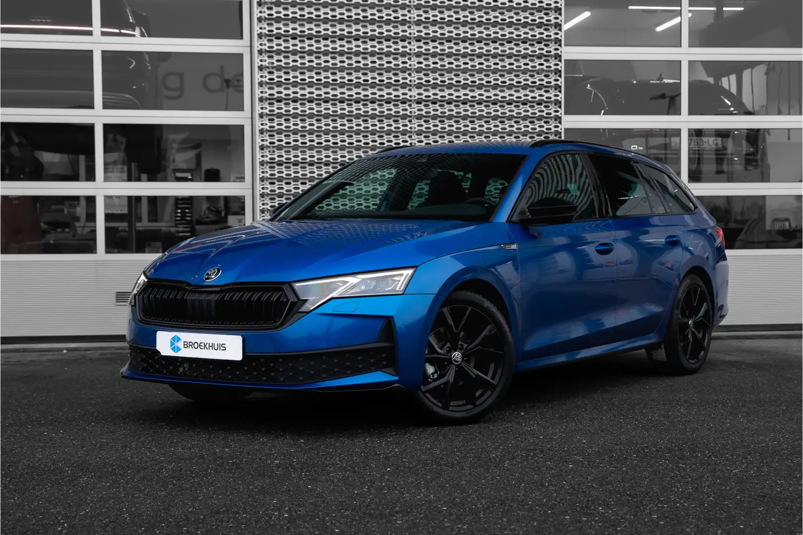 Skoda Octavia Combi 1.5 TSI MHEV Sportline Business | Matrix | A Blauw - 1