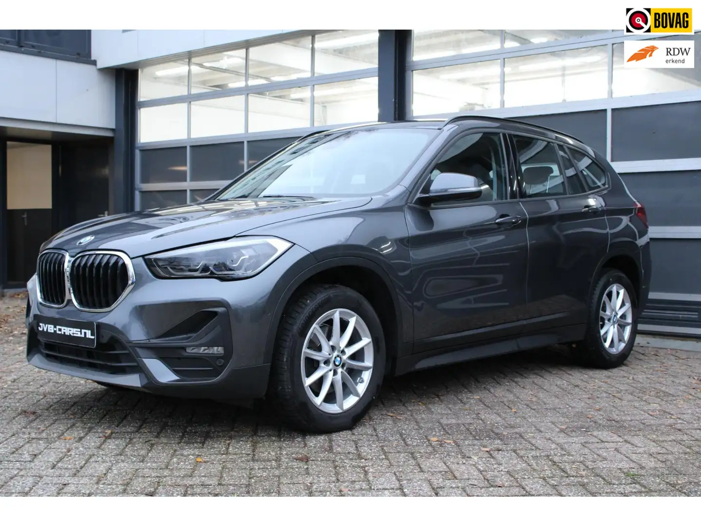 BMW X1 SDrive18i/Leer/Automaat Grijs - 1