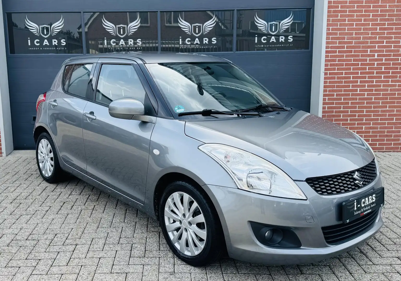 Suzuki Swift 1.2 Comfort 1e eigenaar LED CRUISE KEYLESS Grijs - 1
