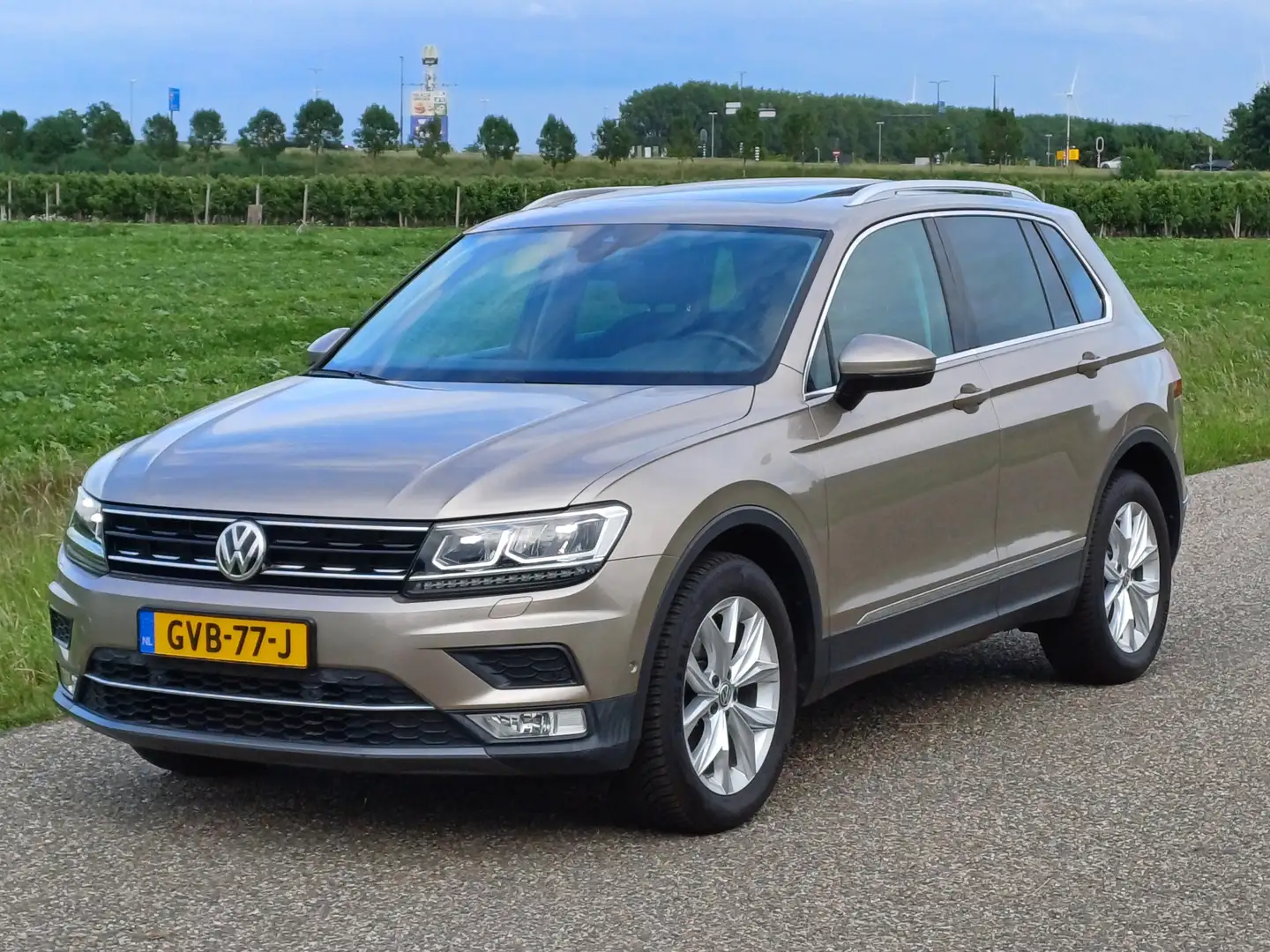 Volkswagen Tiguan 1.4 TSI 4Motion Highline /Nieuwstaat !/Pano/Camera Amarillo - 1