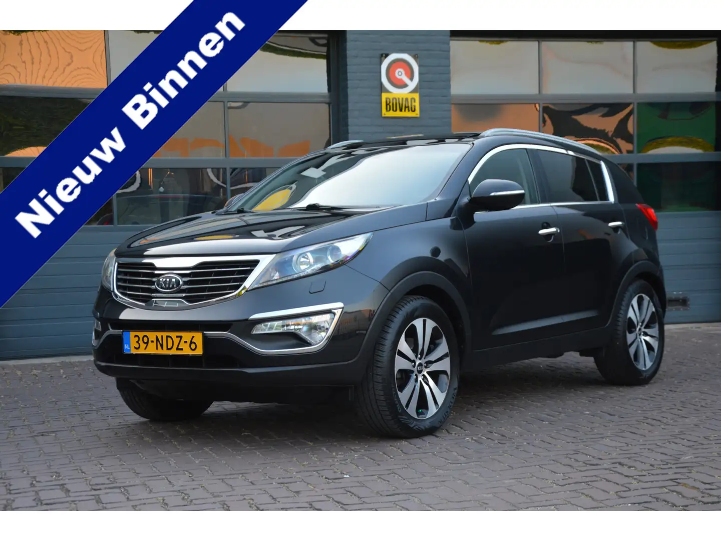 Kia Sportage 2.0 X-Clusive First Edition Automaat Negro - 1