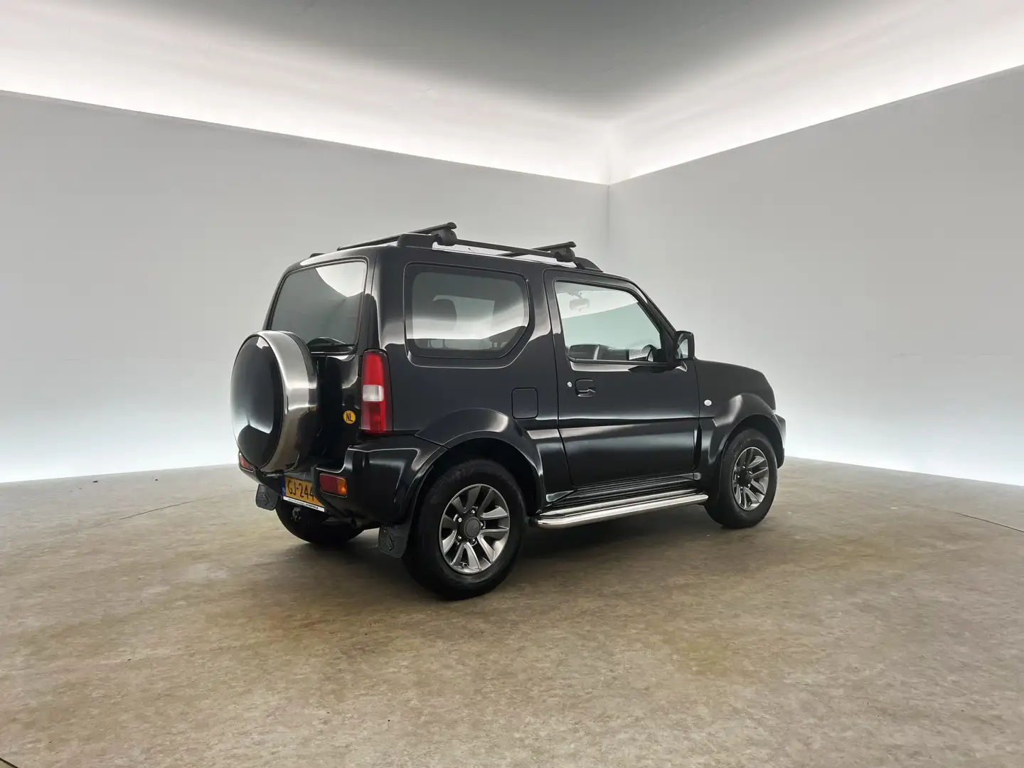 Suzuki Jimny 1.3 Exclusive 4x4 AWD Airco Trekhaak 15"LMV Stoelv Zwart - 2
