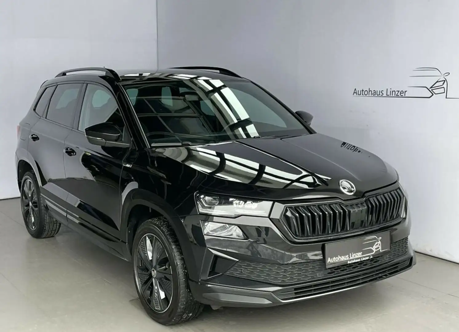 Skoda Karoq Sportline *MATRIX*ACC*AHK*LenkradH*KeyGo*CAM Schwarz - 1