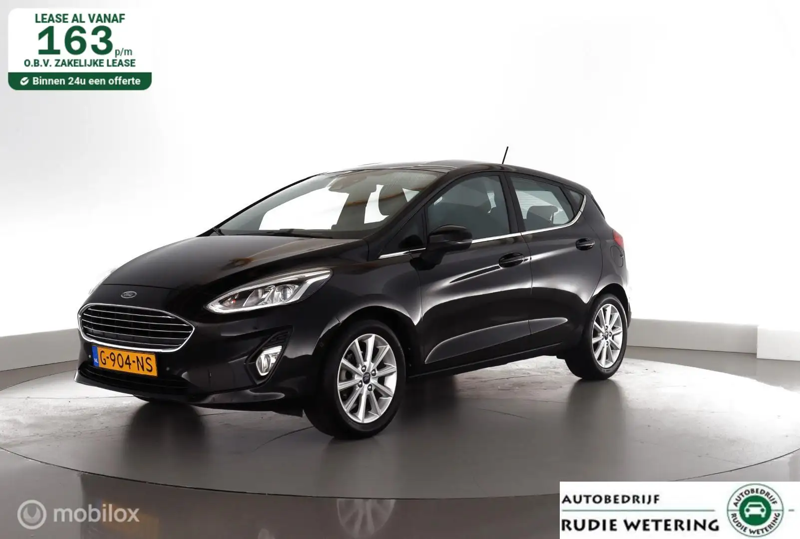 Ford Fiesta 1.0 EcoB. 101pk Titanium NL-auto|nav|cam|ecc|lmv16 Schwarz - 1