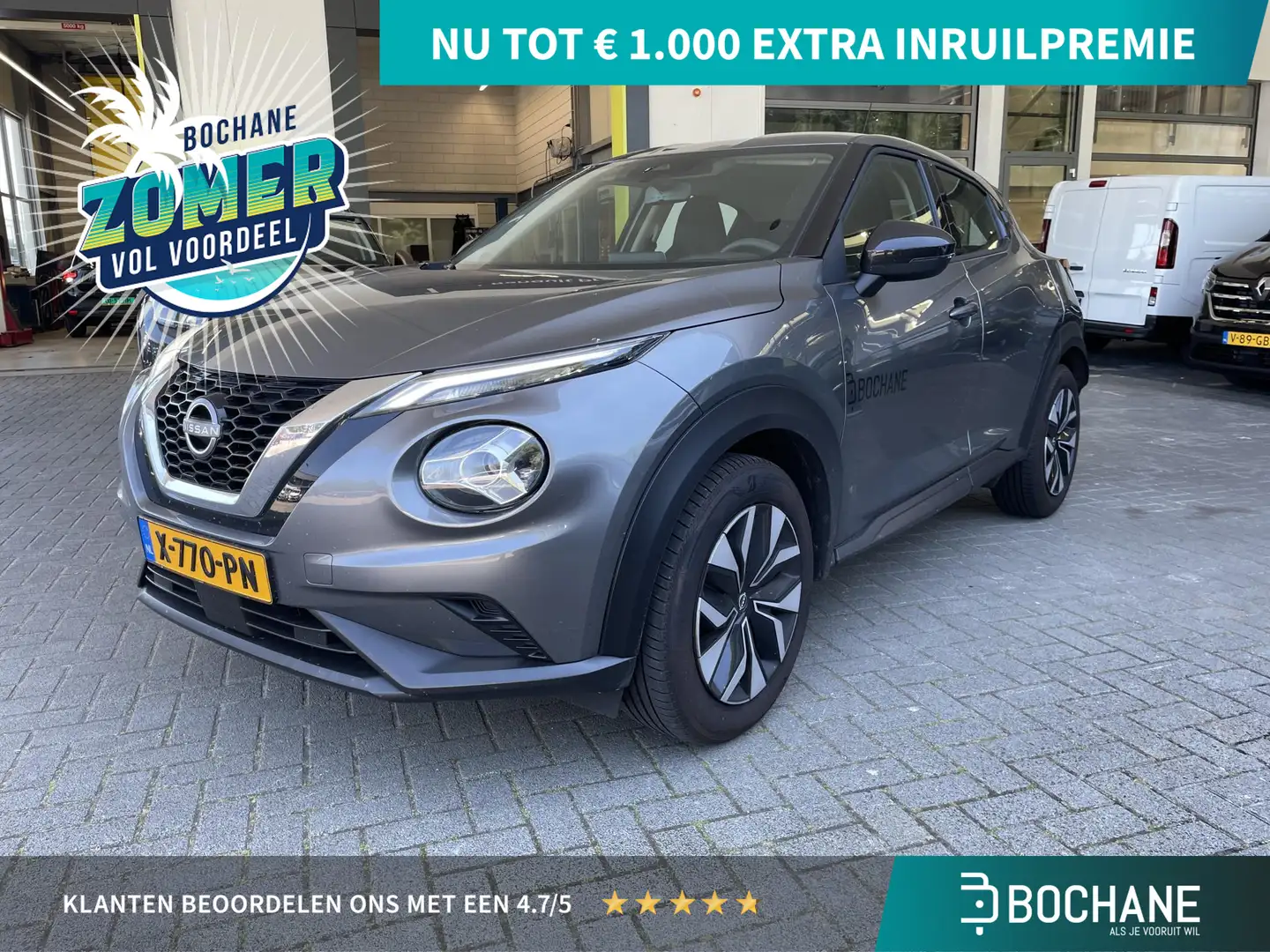 Nissan Juke 1.0 DIG-T 114 Acenta Grijs - 1