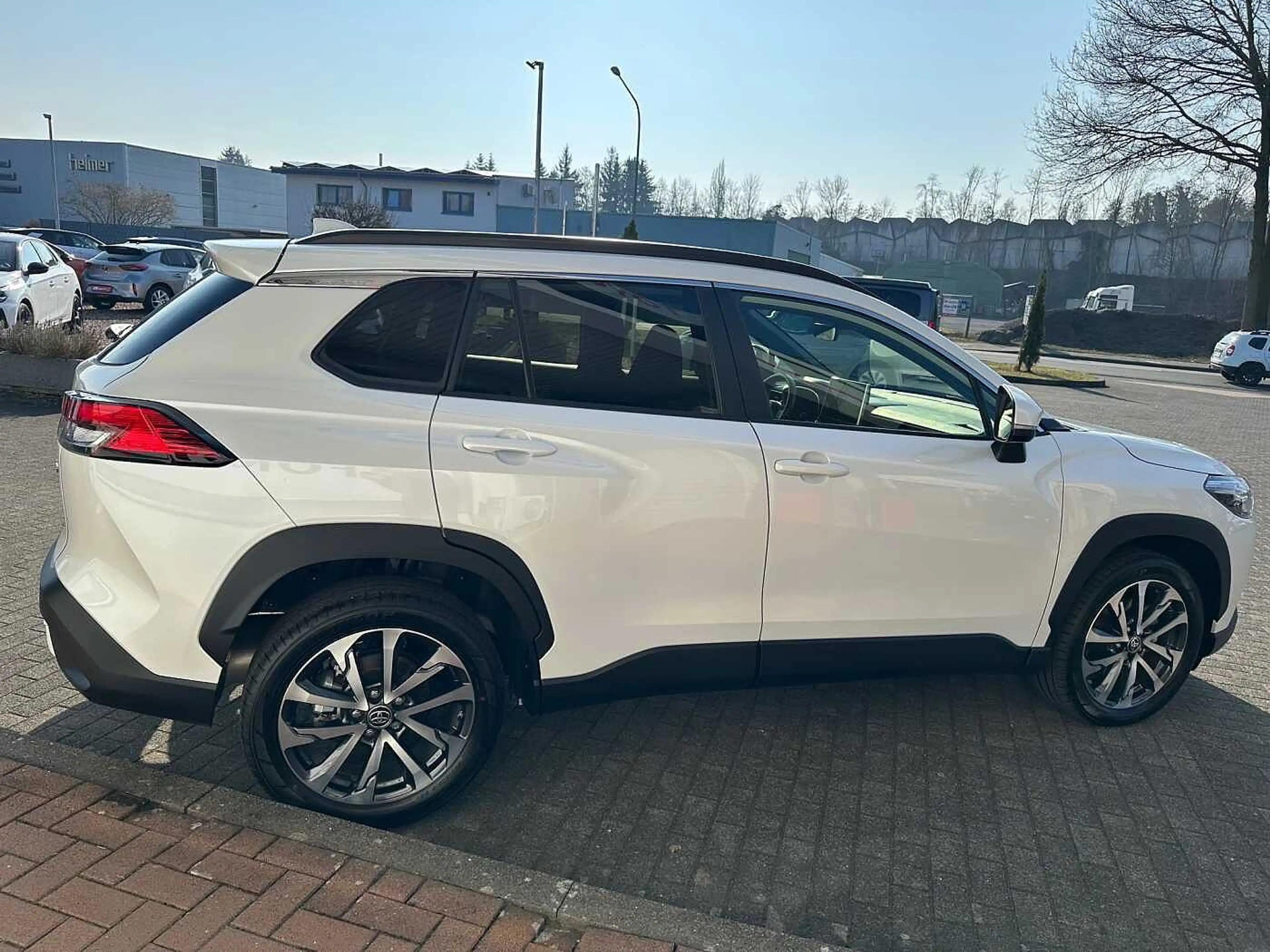 Toyota Corolla Cross 1.8 Hybrid Style - Allwetter, NAVI, LHZ, LED, PDC, — photo 6