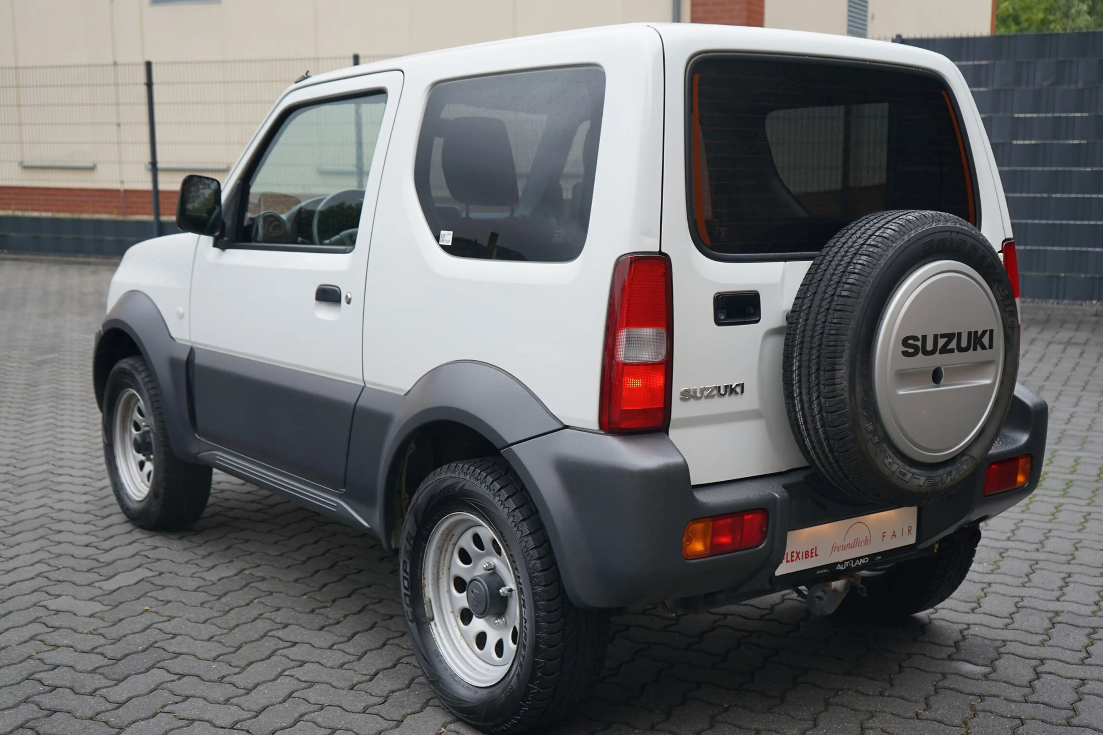 Suzuki Jimny 1.3 Club 4x4 AHK Bluetooth — photo 4